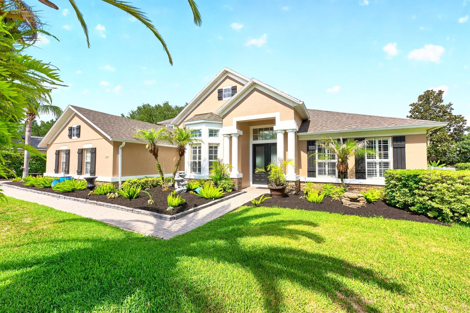 One or more photo(s) has been virtually staged. No detail has been missed in this exceptional POOL HOME, perfectly situated on an oversized .37 ACRE LOT in the GATED COMMUNITY of Wekiva Run! With a new upstairs A/C & WATER HEATER (2026), NEW POOL PUMP (2025), and NEWER ROOF (2023), this home delivers peace of mind alongside a timeless design and highly desirable floor plan. From the moment you arrive, the manicured landscaping, excellent CURB APPEAL, paver driveway and 3-CAR SIDE ENTRY GARAGE set the tone for what awaits inside. The spacious layout offers the perfect balance of formal and casual living spaces, with OPEN CONCEPT gathering areas designed for everyday living and effortless entertaining. At the heart of the home is a chef-inspired kitchen that will impress even the most discerning home cook. Rich cabinetry, complementary granite countertops, upgraded STAINLESS STEEL APPLIANCES, a BUILT-IN DOUBLE OVEN, abundant storage, and a large center ISLAND make this space as functional as it is beautiful. The kitchen flows seamlessly into the impressive family room and light-filled breakfast nook creating a warm and inviting atmosphere throughout. The coffered and tray ceilings, CUSTOM BUILT-INS and upgraded design features elevate each and every space throughout the home. Thoughtfully designed with SPLIT BEDROOMS, your expansive PRIMARY SUITE is on its own private wing. This luxurious retreat features direct access to the lanai, a CUSTOM WALK-IN CLOSET, and a stunning en-suite bath complete with DUAL/SPLIT VANITIES, a SOAKING TUB, separate WALK-IN SHOWER, and exceptional storage. A secondary bedroom suite on the opposite side of the home offers privacy for guests or multigenerational living. With flexible spaces throughout and the option for up to five bedrooms, this home adapts to your lifestyle needs. Upstairs, you will find a spacious BONUS/LOFT, an additional bedroom, full bath, and dedicated utility/storage room – ideal for a media room, game room, home office, fitness space, or guest retreat. Once you have explored the interior – step outside to your own private backyard oasis. The SCREENED ~ HEATED ~ SALTWATER POOL and SPA are surrounded by multiple seating areas, a COVERED LANAI, green space, and plenty of room to relax or entertain year-round. The electric pool heater was replaced in (2021), adding to the home's long list of thoughtful improvements. Located within the established gated community of Wekiva Run, residents enjoy three gated entrances, a community park, playground, neighborhood events, spacious homesites, and a welcoming atmosphere. Zoned for TOP-RATED SCHOOLS and conveniently located near SR-429, shopping, dining, Orlando, Sanford, area attractions, and Disney Parks, this home offers the ideal blend of luxury, privacy, and convenience. A truly must-see property that feels updated, timeless, and ready for its next chapter. Call today to schedule your tour!
