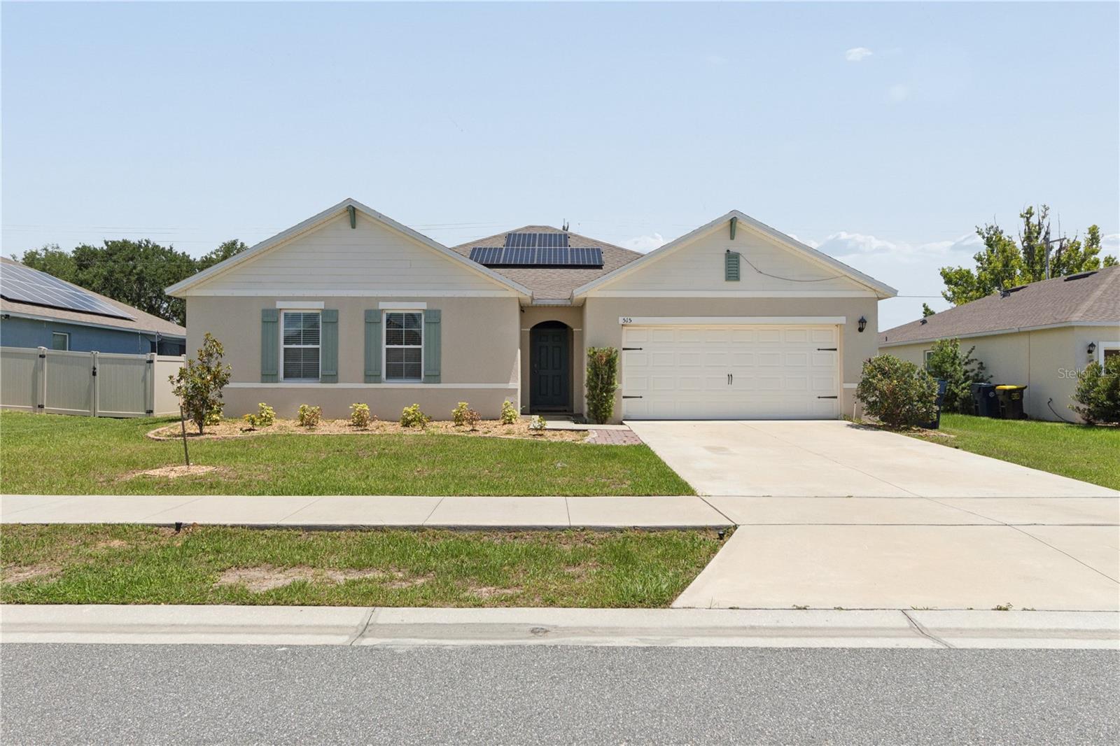 Welcome to this beautiful 4-bedroom, 2-bath home located in the rapidly growing community of Auburndale, just 30 minutes from Disney and conveniently close to shopping, dining, schools, and major highways. This move-in-ready home features a spacious open-concept layout with a bright living room that flows seamlessly into the kitchen and dining area, making it perfect for everyday living and entertaining.

The owner's suite offers a large walk-in closet and an en-suite bath with dual sinks. The second bathroom also features double vanities, providing added convenience for family and guests. Step outside to enjoy the large, fully fenced backyard with plenty of space for pets, play, or future outdoor entertaining.

This home also includes solar panels that help reduce monthly utility costs. As an added incentive, if the buyer assumes the solar panel agreement, the seller will reduce the purchase price by $20,000, from $370,000 to $350,000. A dedicated laundry room comes complete with a washer and dryer that are only one year old.

Don't miss this outstanding opportunity to own a spacious, energy-efficient home in one of Central Florida's fastest-growing communities. Schedule your private showing today!