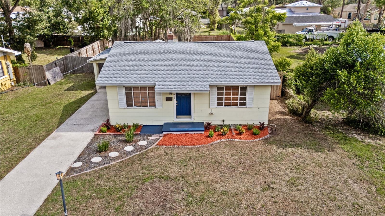 Located in the highly sought-after Hampton Terrace Historic District of Old Seminole Heights, this property is the ultimate empty canvas ready to be personalized and made into what could become one of the neighborhood's most charming little homes. Situated on a lovely street with a covered carport, the home features nice wood floors throughout, two comfortably sized bedrooms both with closets, a large laundry/utility room, and a new dishwasher with updated electrical (2023). Major structural peace of mind includes a newer roof (2019) and a large, fully fenced backyard enclosed with a new fence (2023) that features a storage shed fully equipped with electricity. With cute curb appeal and an incredible lot, this property is primed and ready for you to unlock its true potential.