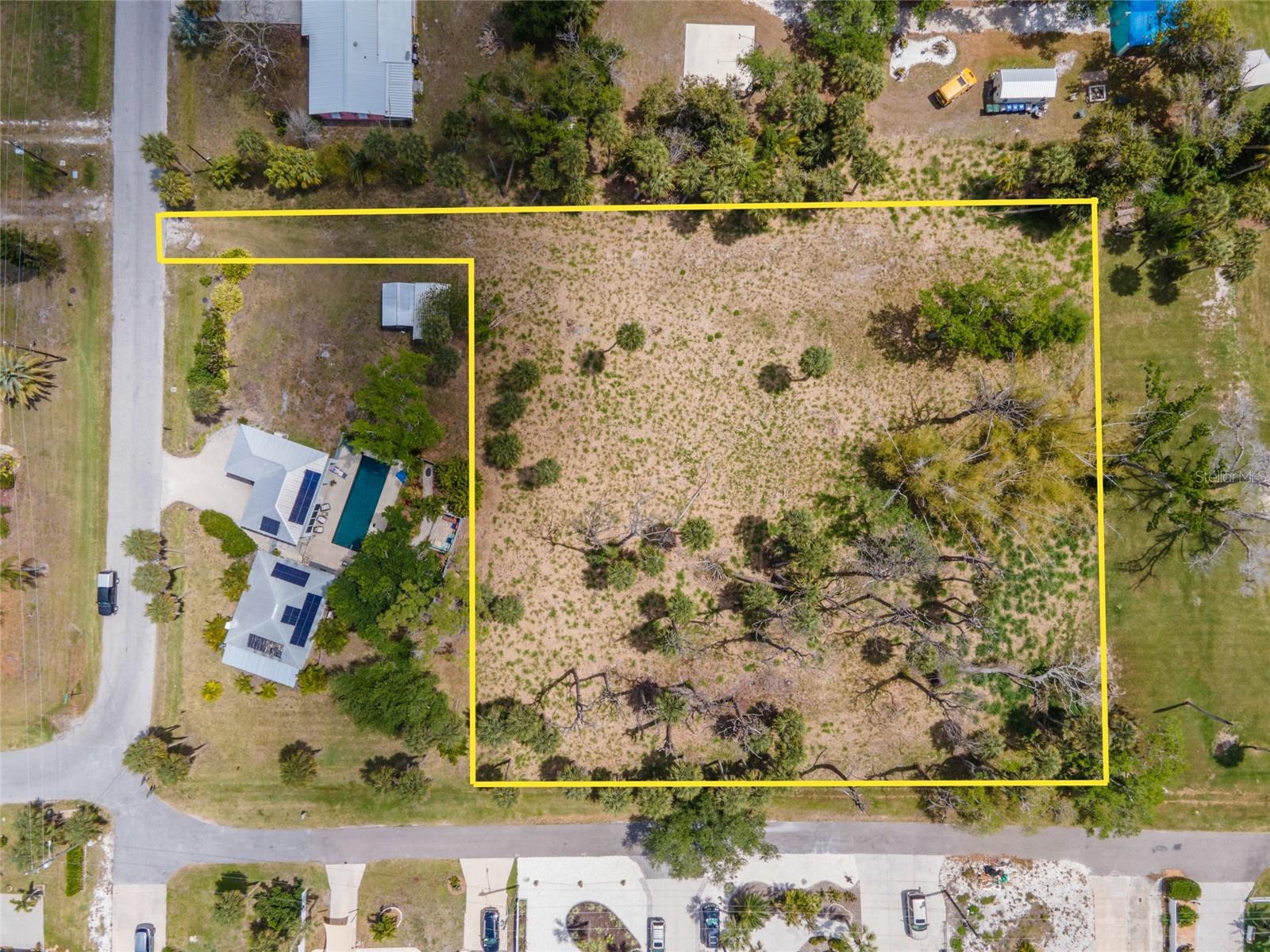 Your chance to create something truly special starts here. This spacious acreage offers a blank canvas with no HOA, no CDD fees, and no deed restrictions, giving you the freedom to design and build exactly what you want. Whether you're envisioning a private retreat, seasonal getaway, or future investment, this property is full of potential. ~~~ Enjoy partial bay views from an elevated home!
Located just around the corner from Indian Mound Park, you’ll have convenient access to boating, kayaking, and waterfront recreation—with a public boat ramp nearby making it easy to get out on the water and explore the Intracoastal and beyond. 
Adding to the appeal, you’re only blocks from Historic Dearborn Street, the heart of Englewood’s charm. Enjoy local restaurants, boutique shopping, farmers markets, art festivals, and community events that create a vibrant yet laid-back coastal lifestyle. This property offers the rare combination of space, flexibility, and proximity to both nature and culture. Call today to see this property!