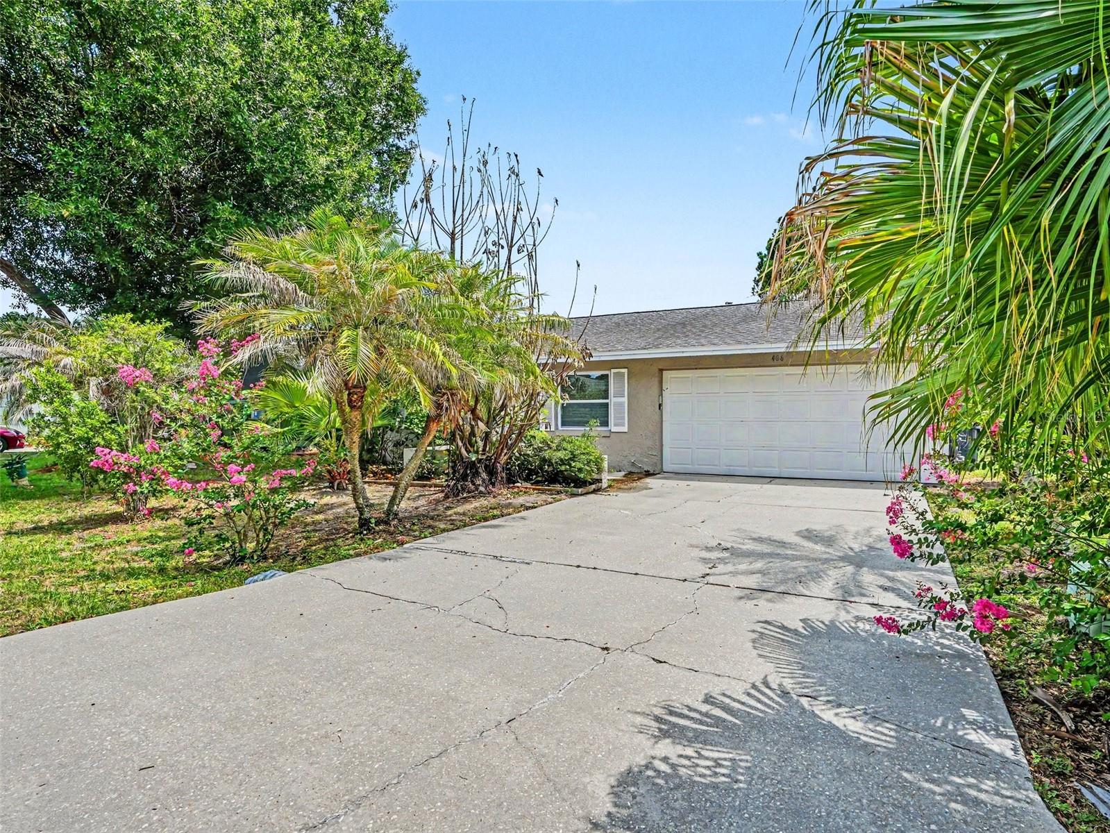 This traditional three-bedroom, two-bathroom home is perfectly situated in the Lake Estates neighborhood. The classic floorplan provides distinct and functional living spaces, offering a comforting separation between rooms. The heart of the home is an updated kitchen featuring durable granite countertops and sleek stainless steel appliances, making it an ideal setup for everyday cooking. Step outside to enjoy a fully fenced-in backyard, offering a private space for outdoor entertaining or relaxing in the fresh air. The location is a standout, centrally positioned just minutes away from local shopping, schools, dining options, and the excitement of Legoland.