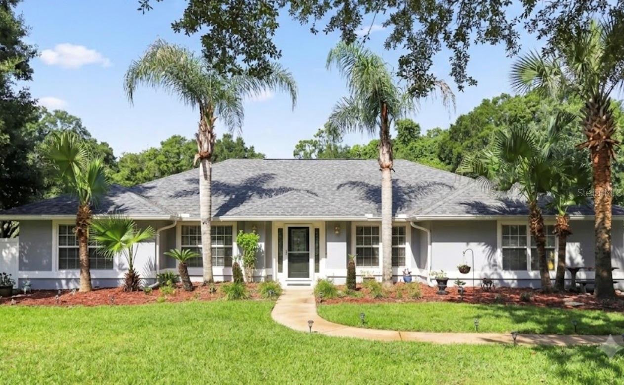 Welcome to Resort-Style Living in Oakbrook — Saint Augustine's Premier Gated Community. Step into your own private retreat at this stunning 4-bedroom plus den pool home, where the outdoor living experience is truly unmatched. Massive 40' X 15' pool, all set on a beautifully landscaped, fully fenced nearly half-acre lot. Whether you're hosting weekend gatherings or unwinding after a long day, this outdoor space was made for making memories. Inside, the open-concept layout flows effortlessly, with the kitchen overlooking the living area and pool views from nearly every angle. A formal dining room greets you at the entry, while a flexible bedroom. The private owner's retreat is tucked at the rear of the home, featuring a spa-inspired ensuite with a large-format tile doorless shower, dual vanity, and private sliding door access directly to the pool. Guests enjoy their own wing on the opposite side of the home, complete with a bonus room and two additional bathrooms including a dedicated pool bath. As a resident of Oakbrook, you'll enjoy access to the community clubhouse, pool, tennis courts, and playground — all within a beautifully maintained gated neighborhood. Close Proximity to the beach, I-95, and the historic downtown. Schedule your showing before its gone!