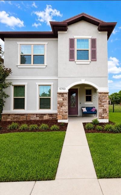 Welcome to FishHawk Ranch West! Situated on one of the largest fenced corner homesites in the community, this beautifully upgraded Pulte-built Clearview model offers 2,148 square feet of thoughtfully designed living space with 3 bedrooms, 2.5 baths, a first-floor office/flex room (or 4th bedroom with walk-in closet), and a detached 2-car garage. The expansive 97' x 83' corner lot provides exceptional outdoor space for entertaining, play, and pets.  Built by the original owners with upgrades throughout, this home features 24-inch tile flooring throughout the entire home, including the stairs—no carpet anywhere. The open-concept first floor is centered around a chef-inspired kitchen showcasing custom rustic Alder maple cabinetry with Baltic stain, Cambria quartz countertops, a tiled backsplash, a massive center island with seating, a breakfast nook, pantry, and a Whirlpool stainless steel appliance package with a natural gas cooktop.
The dining area flows seamlessly into the spacious family room, filled with natural light and offering access to the 24' x 8' covered lanai, perfect for grilling or relaxing outdoors. A convenient powder bath and versatile office/flex room complete the first floor.  Upstairs, a generous loft creates additional living space and provides separation between the secondary bedrooms and the private owner's suite. The secondary bedrooms feature ceiling fans and share a full bath with a tub/shower combination. A second-floor laundry room includes a utility sink along with the washer and dryer.  The spacious owner's retreat features a tray ceiling, 2 large walk-in closets, and a luxurious en-suite bath with dual vanities topped with Cambria quartz, a walk-in shower with rainfall showerhead, private water closet, and linen storage.  Outside, you'll appreciate the enormous fully fenced backyard, ideal for pets, playsets, and outdoor entertaining. A large green space in front of the home adds even more room to enjoy the outdoors. The detached 2-car garage, accessed from the rear alley, includes two built-in overhead storage racks.  Residents of FishHawk Ranch West enjoy exceptional resort-style amenities, including multiple pools, a lake house with game rooms, fitness center, clubhouse, dog park, playgrounds, parks, and miles of scenic walking and biking trails. The home is zoned for highly rated schools, including Newsome High School, one of East Hillsborough County's top-rated high schools. Elementary and middle schools, along with Publix, are conveniently located within the community, while shopping, dining, and major commuter routes including US-301 and I-75 are just minutes away.  This rare combination of upgrades, space, and location makes this home a standout opportunity in FishHawk Ranch West.