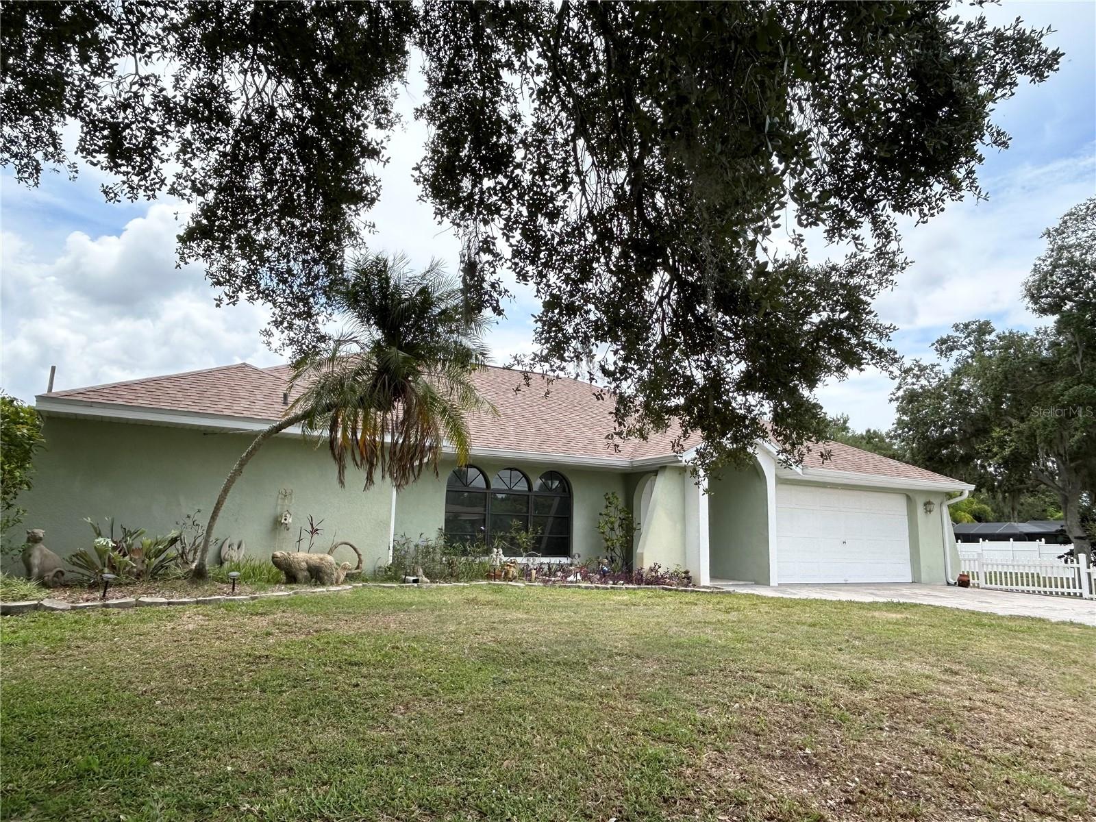 Under contract-accepting backup offers. This is IT!! EXTRA Cleared, Tree lined LOT comes with this Lovely HOME. PENDING, ACCEPTING BACKUP OFFERS!  LARGE, OPEN & Airy Floor Plan!  1,998 sq. ft. under air with Total of 2,848 sq. ft under Roof!  SPLIT Floor plan of 1986 build makes for comfortable living & style.  Double Door entry to the Foyer, Entryway.  LARGE Arch to Huge Living Room with Vaulted Ceilings.  Ahead is hallway to Family Room & Kitchen.  Living Room with 3 Arched windows for Natural Light opens to Dining Room which has Sliders that 'pocket' open to lanai & Pool.  KITCHEN has a Good amount of CABINETS.  Double Sink with window for PASS-thru to Exterior living area.  Breakfast Bar and NOOK sliders out to Pool/Lanai.  Large OPEN Family Room!  HIGH Ceilings, Bright and welcoming.  SPLIT Bedrooms - Master BR - 2 WALK-IN closets (5x4 each) with pocket doors.  Master Bathroom with double sinks, Vanity counter, Linen CLOSET, LARGE Beautifully tiled Shower with Seat.  SLIDERS also Pocket OPEN.  BR2 and BR3 off FAMILY Room side with their OWN WALK-IN Closets.  Access to Pool from BR3 slider and HALL to Pool/Hall Bath, Large LINEN Closet for POOL Towels.  Fabulous OUTDOOR area with PAVER PATIO.  COVERED Patio (33x12) has BUILT-IN Center Island & Bar, Eating Areas which also have Storage underneath.  FOUR Sliders OPEN out to this OUTDOOR Living AREA along with POOL Bath door and Exterior SHOWER.  What about the POOL!!  Specialty built POOL with Steps in, Seated Area and Deep End.  You will LOVE this ENTIRE 'Outdoor' Set up for ALL Gatherings!  Views of the Extra LOT, still shaded and giving privacy.  There is also a LARGE SHED (20x11) with electric and 2 door openings.  ALL this!!  Homes is 'move-in' but you might want to add your own TLC.  (All Dimensions are Approximate - Buyer to Verify ALL INFO)