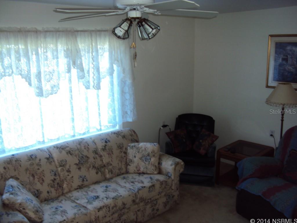 Don't let the age fool you, this mobile home was just totally renovated inside and out. New floor and wall coverings, new windows, new cabinets, new appliances, new vinyl exterior, new insulation. new electrical and plumbing. For the price this one is a steal. Two LARGE sheds and an over sized yard for the boat or RV. This is a turn-key home.