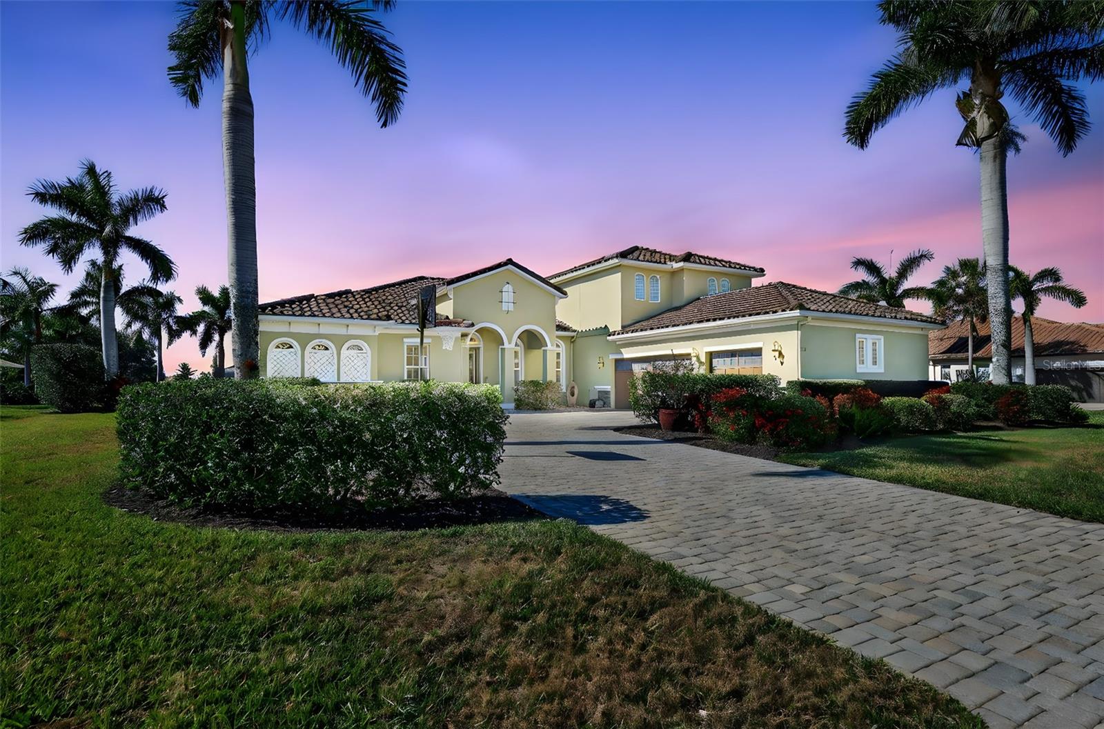 This 3800 plus sq. ft. Osprey C model is a must see with four bedrooms, four bathrooms, separate office, large bonus room with full bathroom, bamboo and tile floors throughout, and impact resistant windows and impact resistant remote screens on the lanai. Situated in Rye Wilderness, a community with half acre lots, no CDD, low HOA, and top schools, the home has wonderful curb appeal with tile roof, longer paver driveway to a three-car side load garage and beautiful pond and preserve views. Enter the home through the ornamental glass entry door to an expansive dining room and living room area with fantastic views of the covered lanai, pool and pond. The master suite has an office forward, large master bedroom with sliders to the lanai, walk-in closet and second closet, and double sink bathroom with walk in shower and garden tub. The updated kitchen includes THREE ovens, large island with breakfast bar and sink, upgraded gourmet kitchen cabinets with ample storage, tiled back splash and large walk-in pantry. There is a second living room off the kitchen with a larger slider with views to the lanai, pool and pond. There are two bedrooms with a shared/guest bathroom adjacent to this living room. The fourth bedroom includes an ensuite and an under stairs large walk-in closet. Upstairs you will find a bonus room, two closets (one a walk-in) and a full bathroom with walk-in shower. With several windows providing beautiful views to the preserve across the street and abundant natural light, this space has many options including a possible fifth bedroom, game room, workout room, or office.  With one of the largest undercover lanais in Rye Wilderness, the home offers a grand gathering space with potential to create the outdoor kitchen of your dreams. The impact resistant motorized screens will protect the home and outdoor space.  Enjoy the salt water, solar heated pool with views of the large pond and beautiful sunsets through the full clearview screen. Situated just north of Lakewood Ranch and Sarasota with Anna Maria Island to the west and St. Pete and Tampa to the north, Rye Wilderness is perfectly located. You will find local restaurants and shopping just minutes away along with Rye Wilderness Park and Fort Hamer Park for hiking, kayaking and boating with access to the big bays within minutes.