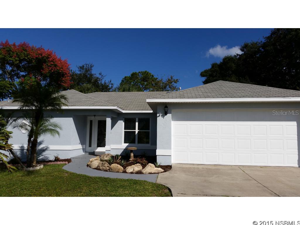 Waterfront - salt water lagoon plus swimming pool.  Scenic and private back yard. Most rooms have a view of the water and pool. Newly painted inside and out. Bamboo hardwood floors.  New shaker style cabinet doors in kitchen with new sink and faucets.  Kitchen has island and lots of storage with double door pantry.  New fans, lights and faucets.  Inside laundry room.  Double car garage.  Located near Flagler Avenue, 3rd Avenue and the Beach. ;Water: City