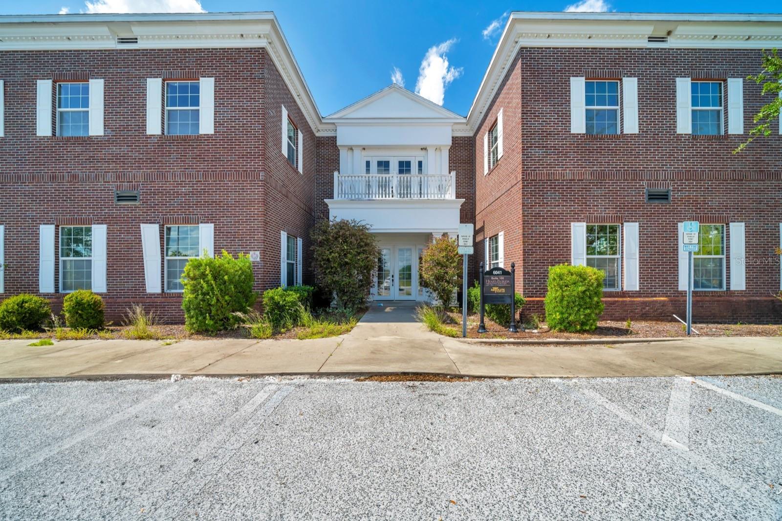 This medical-use condo, located in Charleston Place on 60th Avenue, offers a turnkey opportunity for healthcare providers seeking a well-equipped space in one of Ocala’s most strategic corridors, just off Highway 200 and surrounded by numerous retirement communities.  The interior layout is thoughtfully designed to support a high-functioning medical practice, featuring a spacious and welcoming waiting room, a receptionist and billing area, a central nurses’ station, two private doctors’ offices, and eight exam rooms. Additional features include a dedicated break room for staff, multiple lab and records rooms, and three restrooms for added convenience. The unit is complemented by an expansive shared lobby and abundant on-site parking, ensuring comfort and accessibility for both staff and patients.