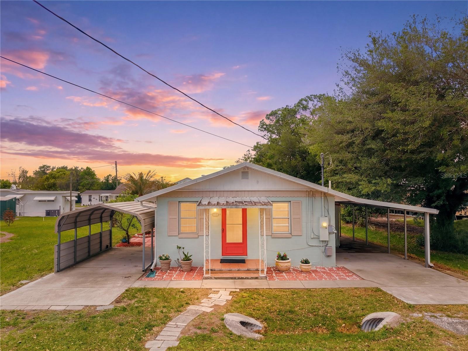 CASH ONLY!!!  BLOCK HOME, METAL ROOF, CENTRAL A/C IS ONLY 5+ YEARS OLD, LOCATED AT THE END OF GAR STREET.......no through traffic, no HOA, all appliances will stay, ENCLOSED FLORIDA ROOM, and a covered SCREENED-IN BACK LANAI!!  Very quaint tiny-home.....kitchen, dining,  bedroom 1, bedroom 2/office/ bonus room, & full bath.  Original Florida room is now used as the living room, utilize the 2nd Florida room as a game room, den, or crafts area.  A half bath outside is handy for yard-work clean-up or a great convenience for BBQ gatherings.  Washer & Dryer will stay, we have TWO CARPORTS, multiple enclosed areas for storage, & a detached shed. Electrical was upgraded in 2000 to support a 200-amp service.  Pine Grove Park has an optional clubhouse you can join.  Location is IDEAL......great proximity to the East Coast Beaches, Lake Nona is approximately 18+ miles away, the OIA is 23+ miles away, St. Cloud offers many lakes for great boating & fishing, our famous attractions are 40+ miles away, enjoy the historic downtown St. Cloud shops/eateries, check out the lakefront park & beach, and truly live the 'simple life'.