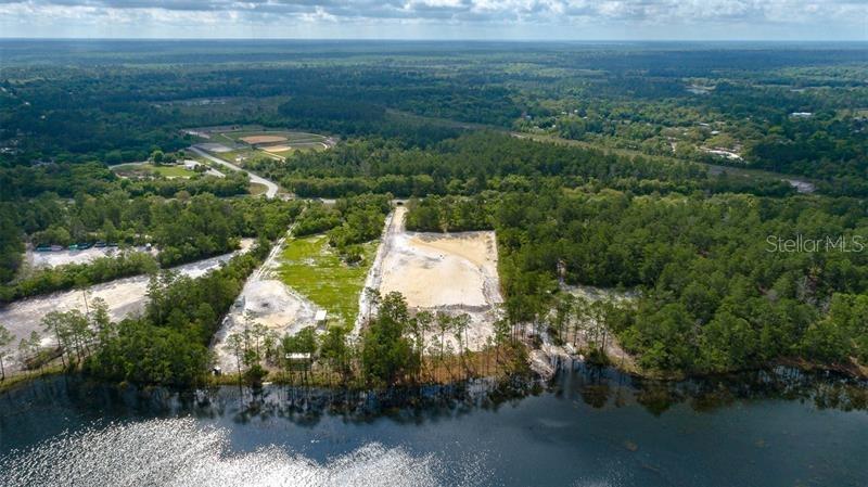 Incredible opportunity to build your dream home on private Lake Lappin! This 4.21 acre parcel is partially cleared, partially fenced and ready to build! Pulling up you'll notice the large buffer of mature trees that have been left at the front of the property to give you complete privacy. Walking to the back of the lot you will be swept away by the beautiful lake view your lot sits on. There is a significant amount of dirt brought in to begin building pad so the lot is just waiting on YOU! Electrical has been run under ground & power utility box is ready to be hooked up to your home. Conveniently located between Deland & Eustis with quick drives to near by shopping, restaurants and entertainment. Golfers will love the Redtail Golf Club, B Bear Golf Club, Eagle Dunes Golf Club, and Glenn Abbey Golf Club all within 8 to 11 miles from your dream home. Come out and view this large buildable lake front lot!