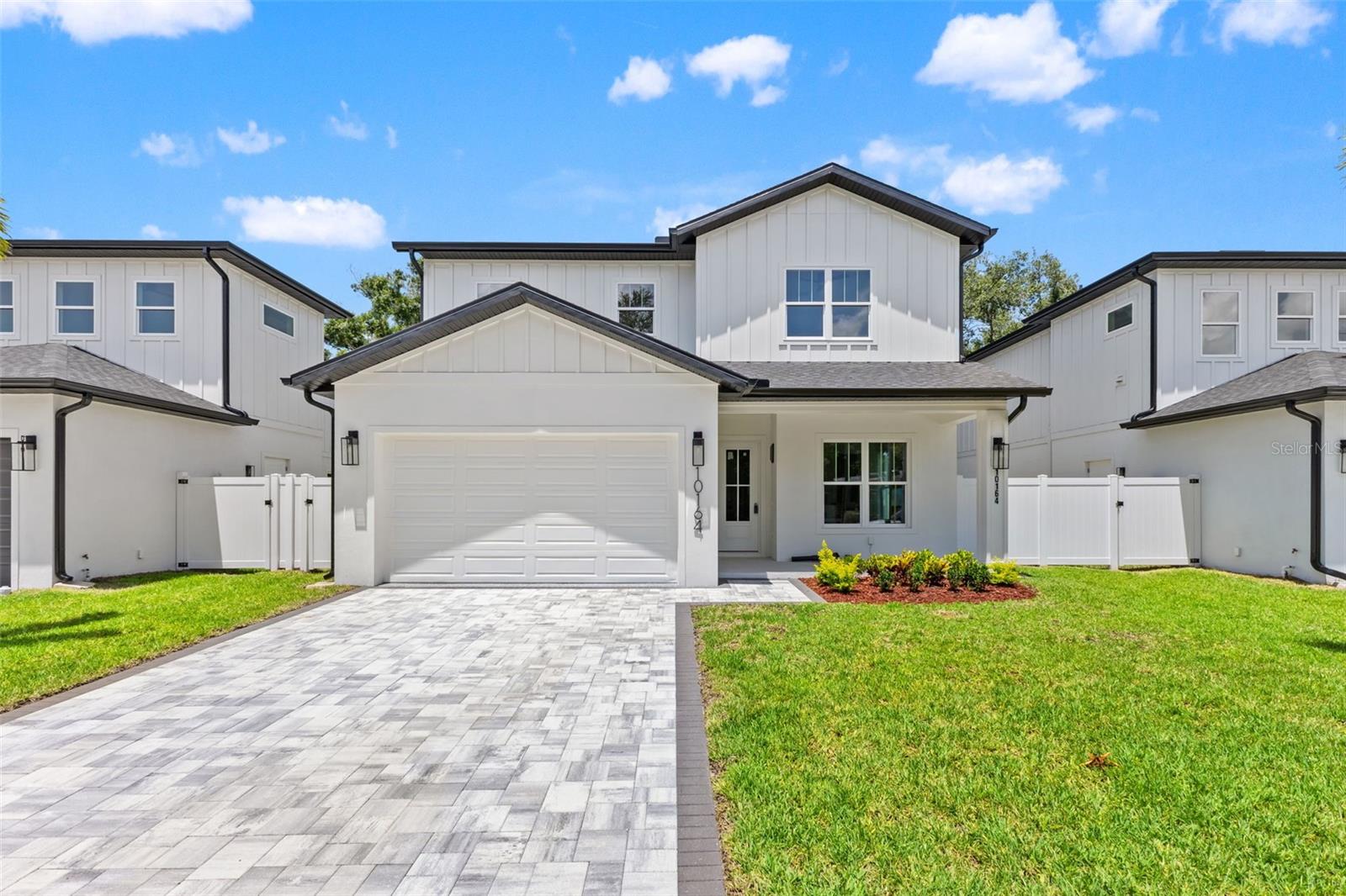 Welcome to The Palms of Seminole, a boutique new-construction community of just six residences showcasing contemporary coastal architecture, located only 2 miles from the beach. The “Aria” floor plan offers 4 bedrooms and 3 bathrooms, thoughtfully designed to combine refined style with modern comfort. Inside, you’ll find high-end finishes throughout, including an open-concept living space, curated designer lighting, and impact-rated windows, no hurricane shutters required.

The gourmet kitchen anchors the home with a Samsung Bespoke appliance package, streamlined cabinetry, and quartz countertops, making it ideal for entertaining or relaxed evenings at home. The expansive primary suite serves as a peaceful retreat, while spa-like bathrooms feature premium tile selections and sophisticated fixtures.

Outdoors, enjoy a private paver driveway, 2-car garage, and professionally landscaped front and rear yards with irrigation throughout—including a well and pump for irrigation to keep water costs low, plus an in-wall pest control system for effortless maintenance. With NO HOA, NO CDD, and no flood insurance required, this home offers true flexibility and peace of mind, all just minutes from renowned beaches, restaurants, and shopping.

Photos may depict similar homes within The Palms of Seminole. There are six total residences with two distinct floor plans available, each featuring unique finishes and color palettes.
