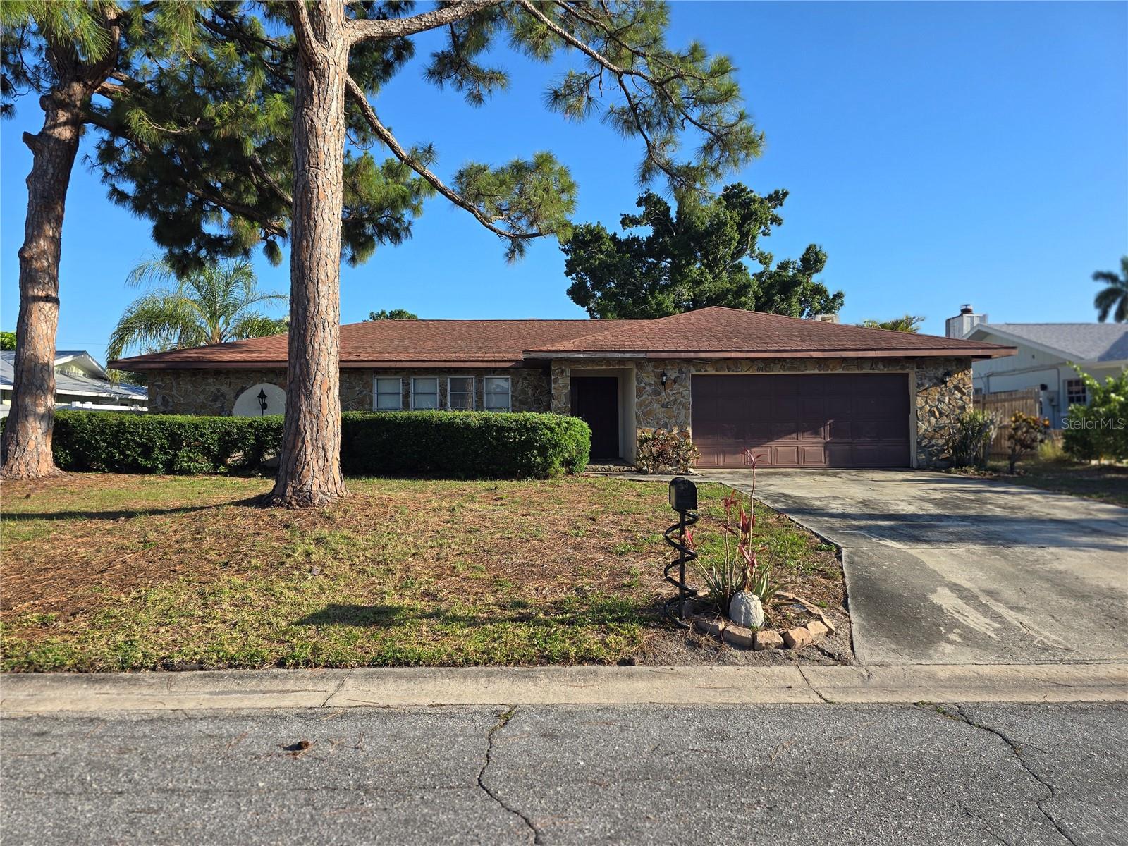 Renovation Opportunity in desireable NW BRADENTON! This 3-bedroom, 2-bath pool home offers 1,816 sq. ft. of living area and is tucked away on a quiet cul-de-sac in Harbor Woods. Featuring a split-bedroom floor plan, living room with fireplace, family room, screened lanai, fenced backyard, and an oversized 2-car garage, this home has great bones and tremendous potential. The property needs updating and repairs and is being sold As-Is for cash buyers only. The pool requires resurfacing and deck work (estimates available in attachments). Located in Flood Zone X with no HOA fees or deed restrictions, this is a rare opportunity to renovate and create value in one of NW Bradenton's most sought-after locations. Convenient to shopping, restaurants, medical facilities, GT Bray Park, Robinson Preserve, and the beautiful Gulf beaches of Anna Maria Island.