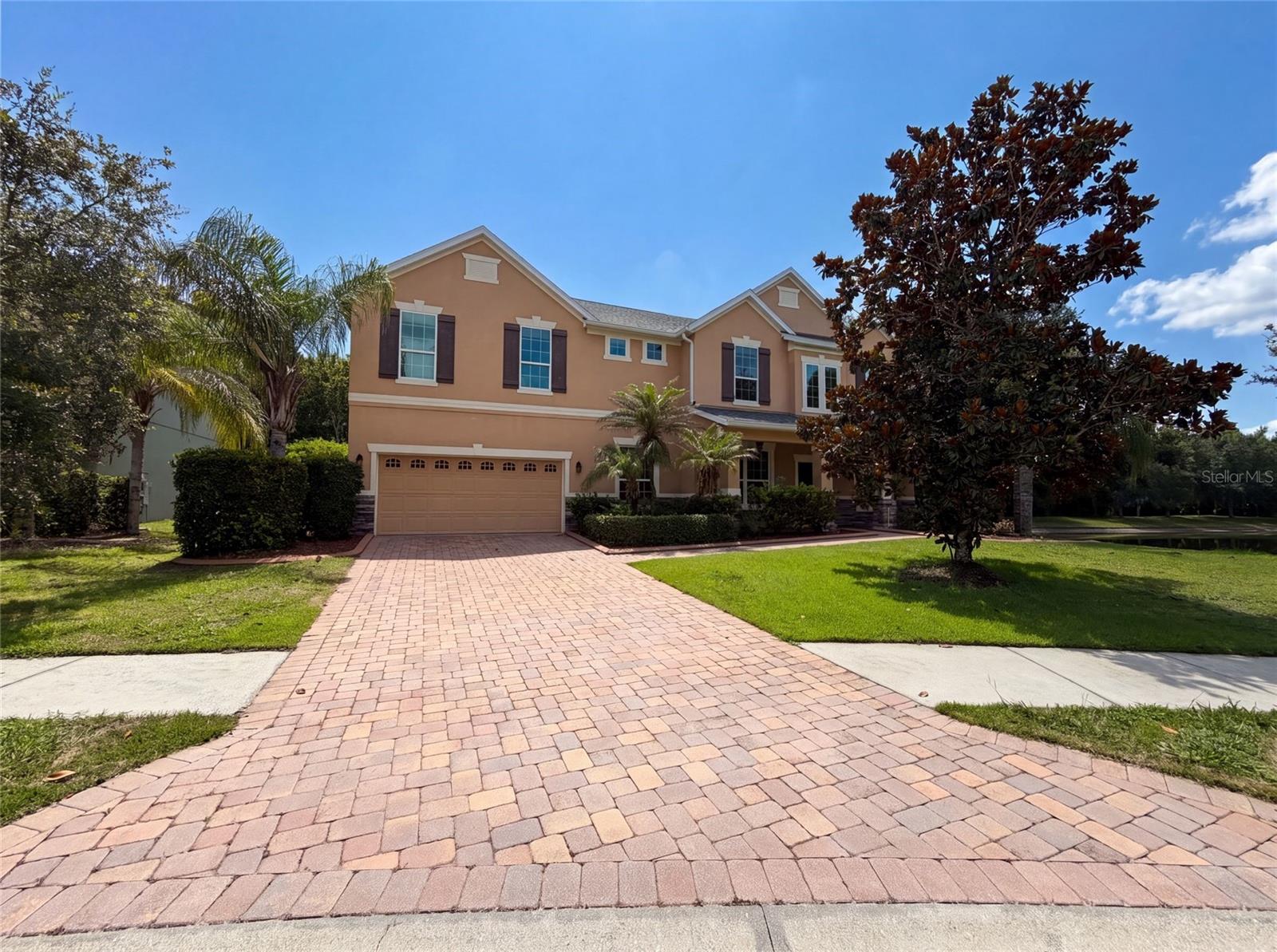 Virtually Staged. 280 Chandler Cir is a two-story Oviedo home built in 2012 with modern finishes and a well-designed layout throughout. The kitchen features stainless steel appliances, quartz countertops, and a walk-in pantry, creating a well-equipped space for cooking and entertaining. The primary bedroom includes a walk-in closet for convenient storage and organization, while the primary bathroom features a separate tub and shower for everyday convenience. A covered patio extends the living space outdoors, with an additional patio and in-ground pool creating an expansive area for relaxation and entertaining. A three-car garage completes this well-maintained residence with practical amenities and comfortable living spaces throughout every room.. Included 100-Day Home Warranty with buyer activation
