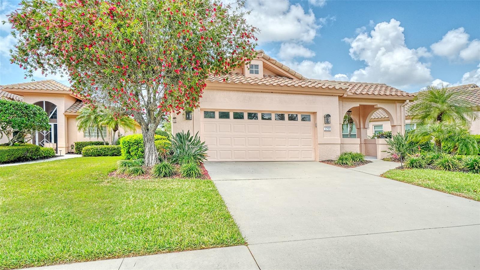 This is an exciting opportunity to live in the boutique community of Mira Lago in Palmer Ranch, offering maintenance-free living in the desirable northwest corner of the ranch, minutes from everything Sarasota has to offer. This well-maintained home features 1,991 square feet with two-bedrooms plus a den, complete with a built-in desk and bookcase, perfect for a home office or flex space. High ceilings and transom windows fill the home with natural light, while the absence of carpet and the neutral color palette create a bright, clean and inviting atmosphere. Recent updates include a new air conditioner (March 2026) and a water heater (2022), providing added peace of mind. Enjoy serene, west-facing views of Crane Lake from the Florida room, where you’ll take in stunning sunsets, blooming native plantings and abundant waterfowl. Mira Lago is a gated community known for its low HOA fees and exceptional amenities, including a community pool and hot tub, four scenic lakes and sidewalks with bench seating throughout. The HOA provides comprehensive services such as exterior painting every eight years (with five color options), lawn care, tree and shrub trimming, irrigation, mulching, annual power washing of driveways and sidewalks, interior pest control and cable service with 120 Frontier channels. The home is conveniently near shopping and dining, with Trader Joe’s coming soon at Beneva and Whole Foods planned nearby. Costco is already just a short drive away. This is a fantastic opportunity to enjoy easy living in one of Palmer Ranch’s most charming communities. Schedule your showing today.