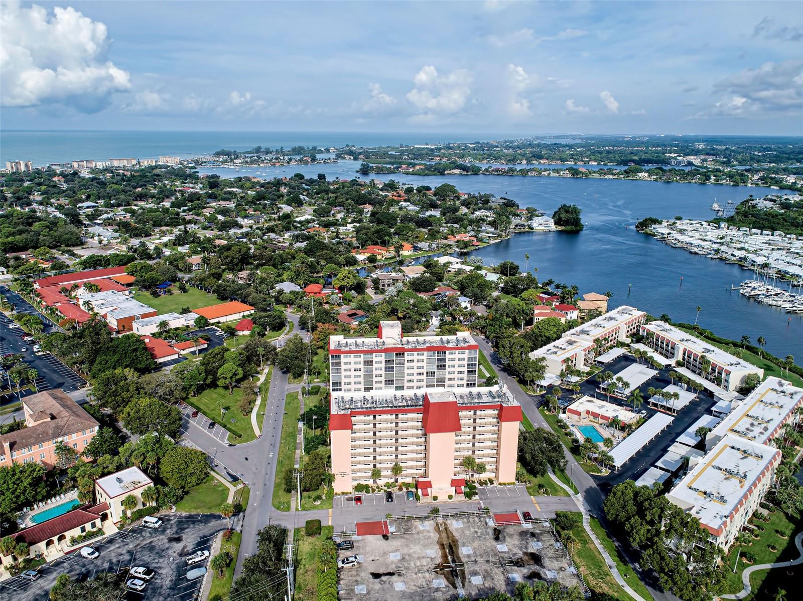 Location, Location, Location! Near the Venice Theater, Centennial Park, Library, Tennis & Pickleball, the beach and restaurants galore. Always something to do with a bike trail cross the street, sports, beach yoga, concerts & art shows at Centennial Park. Restaurants and shopping across the street. This condo is an end unit which offers about 10% more living space and 50% more natural light. It has recently been renovated throughout offering new flooring, fixtures, paint and impact / hurricane doors that will protect you and your stuff. Plantation shutters, new shades, a Nest thermostat and digital door lock are the finishing touch for a turnkey move in with remote access. Below market owner financing available.