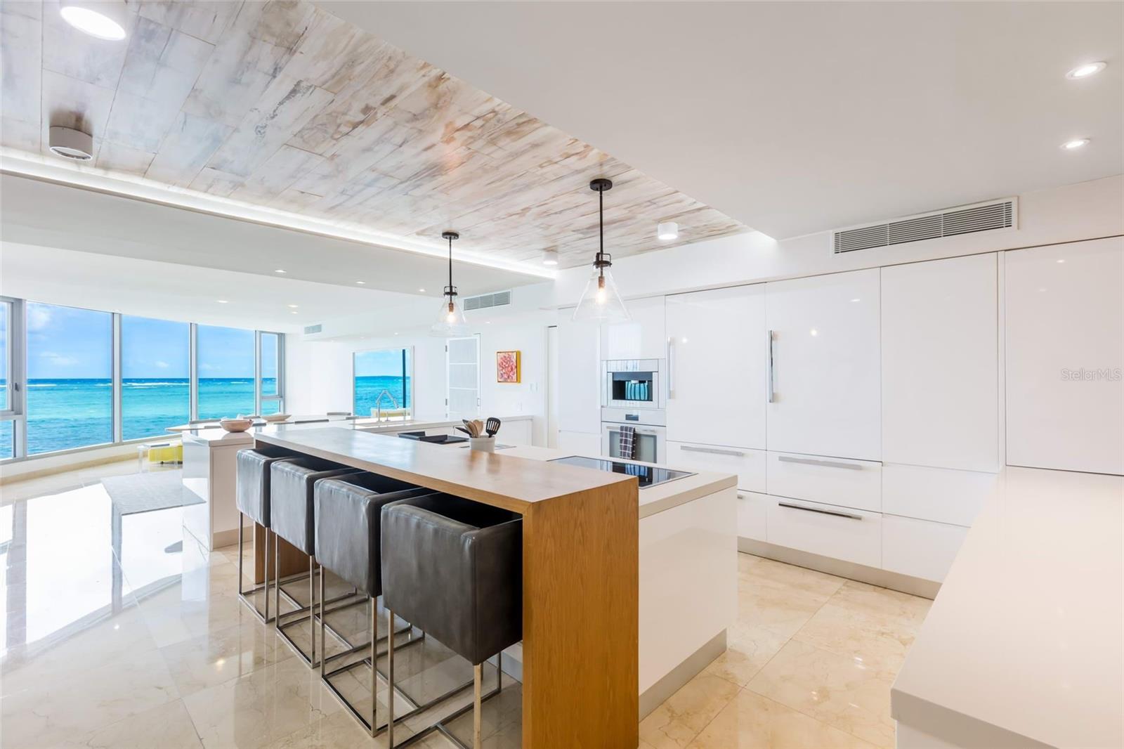 This spectacular oceanfront penthouse boasts glamour and charm, offering stunning ocean views from the moment you step into the residence.

With 3,232 square feet, it has a total of 3 bedrooms including a master suite with breathtaking view, 3 bathrooms, a powder room and 3 parking spaces equipped with one Porsche EV charger.

Floor to ceiling glass expose dramatic views of the Atlantic Ocean pouring sunlight into the home throughout the day. The welcoming state-of-the-art open kitchen outfitted with custom cabinetry includes all high-end appliances.

Its luxury primary suite features a private terrace that showcases clear water views that can be enjoyed all the way in from its spacious bathroom.

Azure Beach is an oceanfront resort-style development with luxurious rooftop outdoor amenities, located at the gated Almendro Street in Punta Las Marias.

An impressive and spacious rooftop terrace with infinity pool, terraces and kitchen area to entertain all guests, offers the perfect spot to enjoy dramatic sunrises and sunsets.

Built: 2010 # Stories: 4 # Units: 8 # Elevators: 2 ~ Full Backup Generator ~ Water Cistern ~ Resort Style Rooftop Terrace ~ Infinity Pool ~ BBQ ||||| 

Experience the ultimate lifestyle and luxury at Azure Beach!