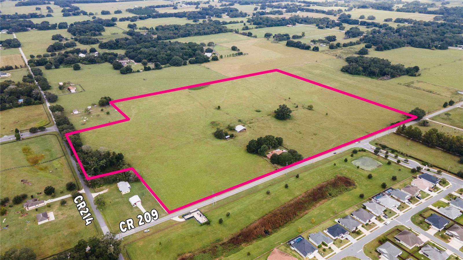 Village of Oxford is a Fifty (50) acre+/- site zoned and approved for up to Six (6) residential units per acre, including townhomes, villas, and single-family residents. Utilities are located on-site and with ample capacity. This site has excellent visibility and access with over 2,100 linear feet of road frontage and is high and dry and fully useable with no loss of developable land to wetlands. This development is poised for success and located only minutes away from The Villages, one of the nation's fastest-growing master-planned communities and the largest 55+ community in the country. With excellent proximity to schools, shopping, entertainment districts, and restaurants, this community is an attractive destination professionals, families, and retirees making it a unique opportunity for single-family homes and long-term rentals alike. Village of Oxford provides incredible access to the Florida Turnpike, I-75, & US Hwy 301.  Orlando, Tampa, and Gainesville are less than an hour's drive. Orlando International Airport, Tampa International Airport, and Disney World are an hour's drive. The Villages Charter School, Super Wal-Mart, Publix, Bonefish, Olive Garden, Red Lobster, Marshalls, HomeGood, and much more are just minutes away. Adjacent neighborhoods (Sumter Crossing & Oxford Oaks) are gated and price points range from the $300's to $2,000,000. Retirees continue to seek their dream homes in The Villages in large numbers. Sumter County, because of the growth of The Villages, ranks sixth in the nation and No. 1 in Florida in new home construction for the decade 2010-20, according to the U.S. Census Bureau. The number of homes in Sumter grew during the 10-year period from about 53,000 to about 75,300, an increase of 42%. The lofty ranking comes as no surprise to Sumter County Property Appraiser Joey Hooten, who witnesses the housing growth on a daily basis. “Sumter County is the envy of the state,” Hooten said. “It’s because we have sustained growth no matter what the economy throws at us.” That can be attributed to the demand for the lifestyle available in The Villages, Hooten said. “No one has done what we’ve been able to do in this county over the last 10 years,” he said. “It’s nothing short of amazing. And it’s all about what’s being offered in The Villages.” It doesn’t appear to be slowing down any time soon either, Hooten added. “People are moving here more than ever,” he said. (George Horsford, Daily Sun)