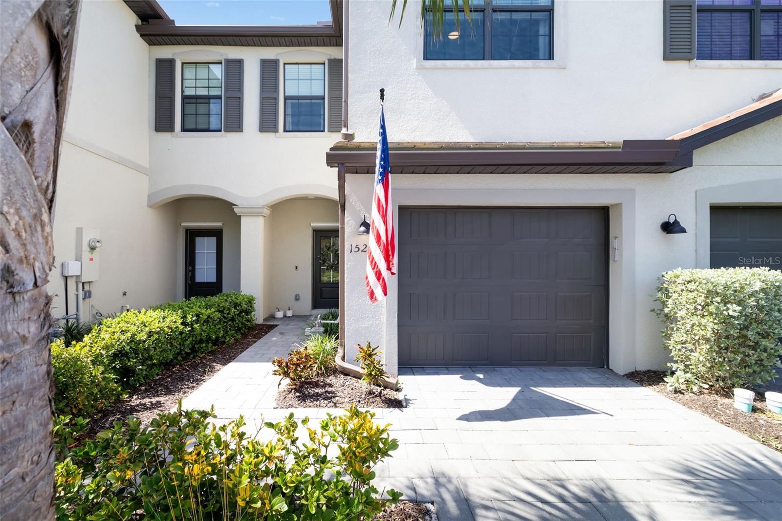 Welcome to 15210 Sunny Day Drive in the highly sought-after Lorraine Lakes community, where resort-style living meets everyday comfort. This beautifully appointed home offers picturesque water views, thoughtful upgrades, and access to an incredible collection of amenities designed for every member of the family.

Step inside to an open-concept floor plan featuring a spacious kitchen with an island, abundant cabinetry, and plenty of prep space—perfect for entertaining or daily living. The kitchen flows seamlessly into the dining area and inviting living room, highlighted by a stunning custom blue accent wall that adds warmth and character. Electric blinds provide effortless convenience, while sliding glass doors lead to the enclosed lanai, creating the perfect space to relax and enjoy peaceful water views year-round. The garage has also been upgraded with durable epoxy flooring for a clean, finished look.

Upstairs, you'll find three generously sized bedrooms, including a spacious primary suite with a charming bump-out that's ideal for a home office, reading nook, nursery, or cozy sitting area. The additional bedrooms have plenty of space for family or guests.

Living in Lorraine Lakes means enjoying one of the area's premier amenity centers. Residents have access to a resort-style pool, splash pad, playground, fitness center with a dedicated play area, indoor basketball court, sand volleyball courts, on-site restaurant and bar, tennis and pickleball courts, walking trails, social events, and so much more. Whether you're looking for relaxation, recreation, or a vibrant community atmosphere, it's all just moments from your front door.

Conveniently located near shopping, dining, top-rated schools, and Gulf Coast beaches, this home offers the perfect combination of luxury, lifestyle, and location.