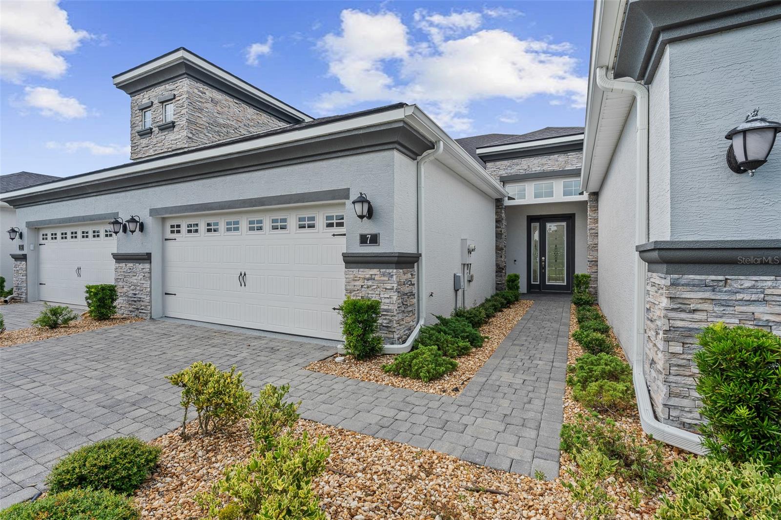 Welcome to 7 Newhaven Lane, where low-maintenance living meets the exceptional lifestyle of Plantation Bay. Nestled within one of the area's premier, gated golf course communities, this beautifully maintained townhome offers the perfect opportunity to enjoy all the amenities and beauty of Plantation Bay while spending less time on home maintenance and more time doing what you love.
Designed for both comfort and functionality, this spacious residence features 3 bedrooms, 3 full bathrooms, a versatile bonus room, a screened lanai, and a thoughtfully designed primary suite with a walk-in shower. Throughout the home you'll find numerous upgrades that enhance both style and convenience, including luxury vinyl plank flooring in all bedrooms and throughout the upstairs, plantation shutters, ceiling fans, a premium LG refrigerator, custom laundry room cabinetry, upgraded closet systems, and an overhead storage rack in the garage.
One of this home's standout features is its exceptional setting. Relax on the screened lanai while enjoying tranquil views of a large green space, conservation area, and the picturesque pond and fountain that welcome residents into Creekside West Villas. From the front of the home, you'll enjoy another expansive green space along with a beautiful pond and fountain, creating attractive views from both sides of the property.
Conveniently located near Plantation Bay's west entrance, this home offers quick and easy access in and out of the community while still providing the peaceful surroundings that make Plantation Bay such a desirable place to call home.
Plantation Bay offers an outstanding lifestyle with optional membership opportunities that include 45 holes of championship golf, multiple clubhouses, resort-style swimming pools, tennis and pickleball courts, a state-of-the-art fitness center, dining, and an active social calendar filled with events and activities. Whether you're seeking an active lifestyle or simply a beautiful place to relax, Plantation Bay has something for everyone.
The home is vacant and move-in ready, making it easy for the next owner to begin enjoying everything this exceptional community has to offer. As an added bonus, buyers of this home are eligible for a substantial discount on Plantation Bay Club's initiation fee. Contact the listing agent for complete details.
