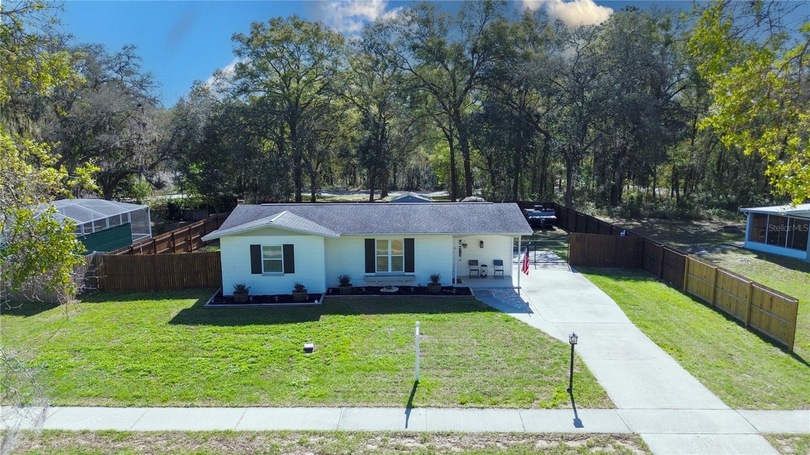 Welcome home! As you approach this charming block home with outstanding curb appeal, you'll immediately feel the warmth and comfort it has to offer. Pull into the spacious driveway, featuring a gate wide enough for an RV or trailer, making your adventures effortless.

After exploring all of Citrus Springs, unwind by the fire in your backyard or relax in the inviting pool. Enjoy a peaceful morning sipping coffee on the beautiful porch, overlooking your private, fully fenced yard. The interior boasts modern stainless steel appliances and a convenient laundry room, ensuring that daily routines are a breeze.

Featuring fresh LVP flooring, new paint, and stylish lighting inside and out, this home is both inviting and contemporary. With a new AC handler and condenser, you can rest easy knowing that this property is worry-free, both inside and out. You will find spacious bedrooms that create the perfect retreat, coupled with ample closet space for all your storage needs. The open-concept layout seamlessly connects the living and dining areas, ideal for entertaining guests and family gatherings.

Enjoy the convenience of walking to Withlacoochee State Trail and recreational areas, perfect for outdoor enthusiasts. Take a quick drive to Rainbow River State Park. This exceptional residence truly offers the best of both comfort and functionality. Don’t miss the chance to make this delightful residence your own!