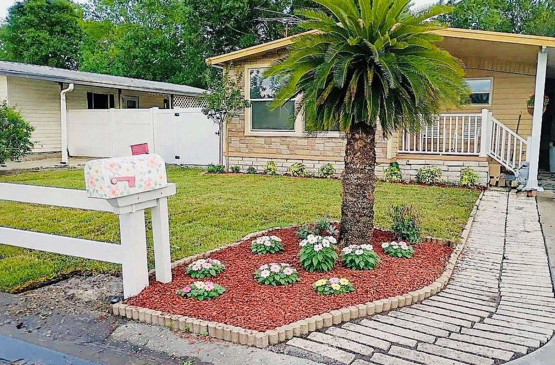 ***GREAT CURB APPEAL*** 55+ Community *** Come take a look at this beautiful COMPLETELY RENOVATED Manufactured Home with Carport AND GREAT YARD. Nice Front door and Porch, Great Luxury Vinyl Flooring throughout. Updated kitchen with stone countertops and NEW APPLIANCES. BIG LOT. The community Sheldon West has 2 large parks, a small lake, a community center, shuffleboard court, and screened, heated swimming pool. Quiet, safe neighborhood, with access to all the local commercial locations. 1 mile from the Veteran's Highway. The best feature is that you OWN THE PROPERTY! NO LOT RENT! Come stop by and take a look you won't be disappointed
