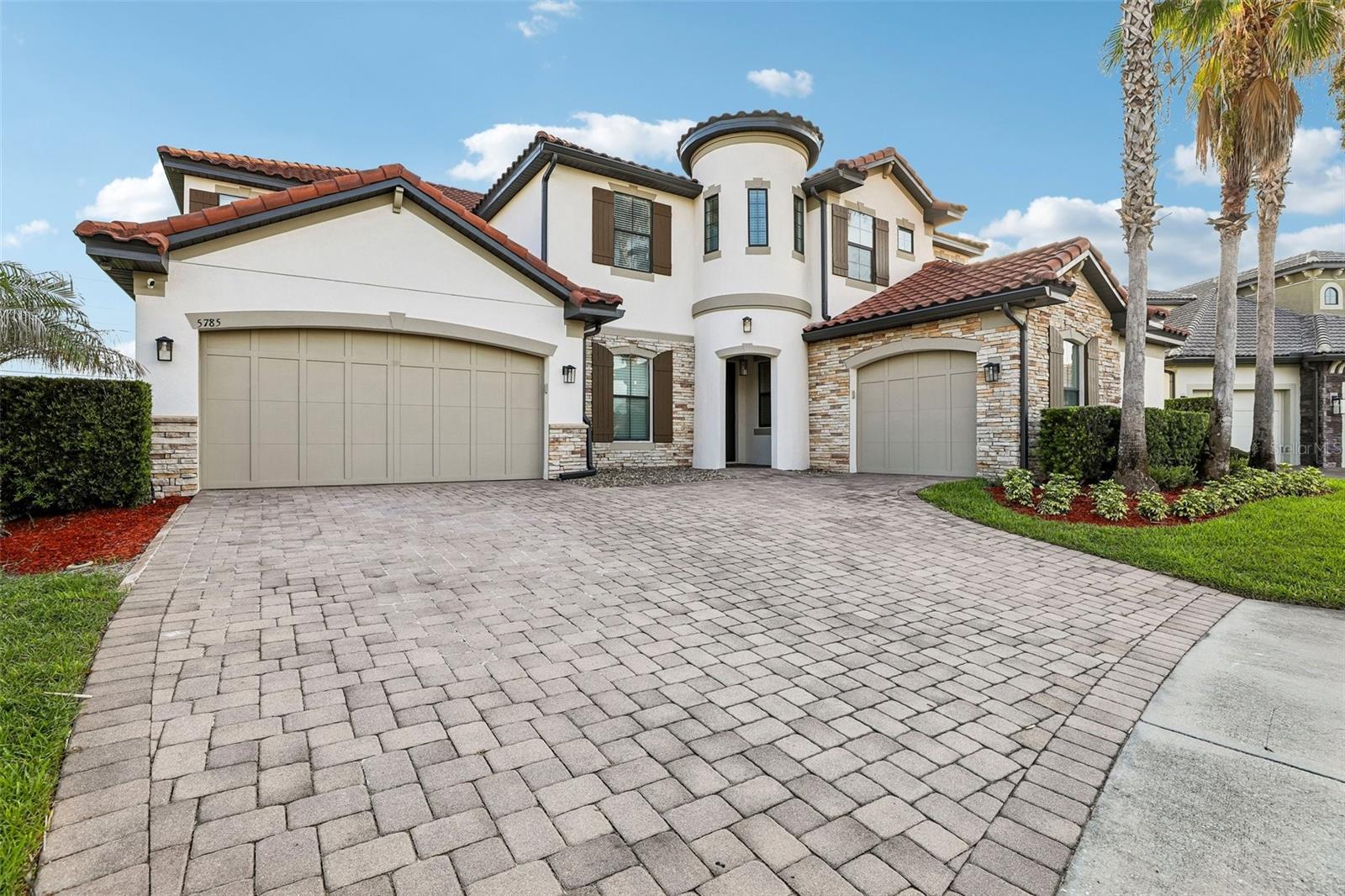 Location meets luxury in this spectacular 6-bedroom, 4.5-bath estate spanning over 5,000 sq. ft. of fully updated living space. Located in one of Seminole County’s most exclusive GATED neighborhoods, this home features a chef’s kitchen with quartz countertops, a DEDICATED HOME OFFICE, a cozy CUSTOM FIREPLACE, A PLAY ROCK WALL CLOSET, and an upstairs THEATER ROOM with a full wet bar. It even offers a LAUNDRY CHUTE for added convenience! A large screened in porch opens up into a resort-style oasis with a SALTWATER POOL and cascading waterfall. This beauty is perfect for multi-generational living with three ensuite bedrooms (including the primary) offering plenty of private space. Located in a top-tier school zone and just minutes from Colonial Town Park or Downtown Sanford featuring shops of all types and a variety of restaurants sure to please any palate! It is also a couple of miles from I-4 for an easy commute to Downtown Orlando, amusement parks, and the east coast beaches! This Home also features tankless water heaters and a water softener system. This one won't last long.
