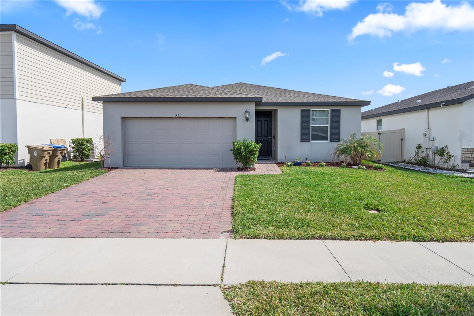 Welcome to this beautifully maintained one-owner home offering 3 bedrooms, 2 bathrooms, and a versatile enclosed den with French doors that can serve as a home office, playroom, guest room, or potential 4th bedroom. Built just four years ago, this energy-efficient single-story home combines modern design, thoughtful upgrades, and pride of ownership throughout.

Inside, you’ll find 9-foot ceilings that create an open and airy feel, along with a functional open-concept layout designed for both everyday living and entertaining. The kitchen features upgraded granite countertops, while additional upgrades include a smart thermostat, whole-house water softener system, and a complete central air dehumidification system for enhanced comfort year-round. The HVAC system has been professionally serviced every six months, and the home has benefited from ongoing professional pest control and lawn maintenance.

Step outside to enjoy a fully fenced backyard with a private gate providing direct access to the open field behind the property, creating a spacious feel and offering added privacy with no immediate rear neighbors. Whether you’re enjoying a quiet evening outdoors, letting pets play, or hosting family and friends, this backyard provides plenty of room to enjoy Florida living.

Located in a desirable community featuring a resort-style pool, playground, and walking trails, this home offers the perfect balance of comfort, convenience, and lifestyle. Complete with a two-car garage and modern energy-efficient construction, this move-in-ready home is ready for its next owner.

All measurements, dimensions, and features are approximate and should be independently verified by the buyer.
