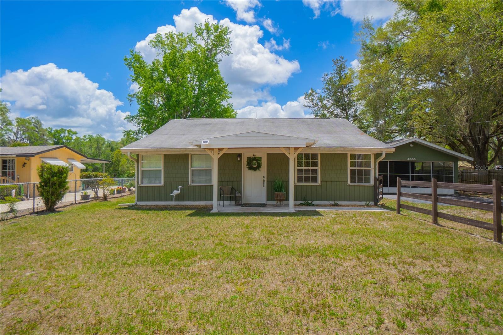 Welcome to your fully furnished waterfront opportunity in River Lakes Manor! This charming 3-bedroom, 1-bath home offers the perfect blend of comfort, flexibility, and income potential—ideal as a primary residence, seasonal getaway, or turnkey Airbnb investment. Inside, you’ll find a spacious layout featuring both a living room and family room, plus an additional flex space that can easily serve as an office, game room, or extra sleeping area. The dining area flows nicely for everyday living or entertaining guests. Step outside and enjoy true Florida living with a newly redone boat dock, providing direct access for boating, fishing, or simply relaxing on the water. The property also offers excellent storage and parking options with a 1-car detached garage and an 2-car carport—plenty of room for vehicles, toys, or guests. Situated on a generous lot with no HOA, this property gives you the freedom to use it as you choose. Whether you’re looking for a cozy home or a ready-to-go short-term rental, this one checks all the boxes. Don’t miss your chance to own a versatile property!