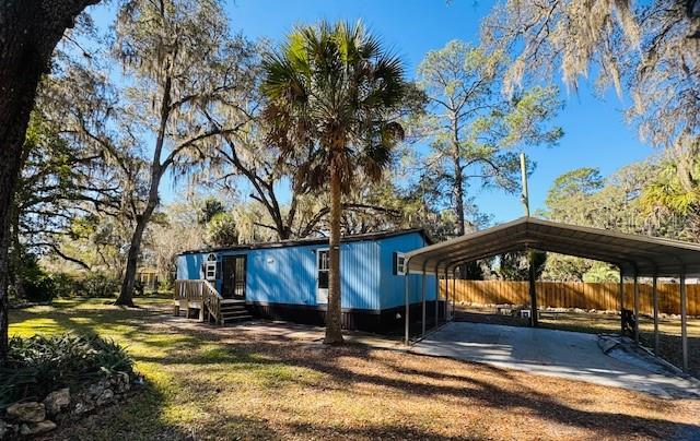 Price Adjustment! Seller and Seller offering 2,500 towards any improvements. Nestled amid the tranquil woodlands of Fort McCoy, Florida, this inviting 2 master bedroom residence offers the perfect blend of rural charm and modern convenience. Surrounded by the natural beauty of the Ocala National Forest and just a short drive to the Ocklawaha river and lake Kerr other local lakes, recreation aras and boat ramps, this property is an oasis for those seeking peace, privacy, and a connection to nature.
Interior Features
Open-concept living and dining areas with large windows that fill the space with sunlight and frame picturesque views
 kitchen equipped with appliances and generous custom resin counter space.
2 Master suites featuring a walk-in closet and a private bathroom, 1with a soaking tub and 1 with a shower
Programmable Central air conditioning and ceiling fan to keep your home comfortable year-round
Freshly painted interior and cabinets
Exterior Features
New Roof installed 2024
 Hurricane impact windows installed 2024
New drain field installed 2025
Privacy fence on rear half of the property
Motion sensor security lighting
Digital resettable keyless entry locks, brink your own keys
Expansive fenced in, zoned A1 property with mature trees, perfect for gardening, outdoor gatherings, raising animals or simply enjoying the quiet countryside
Covered 2 car carport,
Front deck ideal for sipping morning coffee or relaxing at sunset
Fire pit with bench seating 
Detached workshop providing extra storage space and room for hobbies
Private driveway with ample parking for vehicles, boats, or RVs
Access to local boat ramps and nearby lakes for fishing and water activities
Location Highlights
Close proximity to the Ocala National Forest, Silver Springs, and many outdoor recreation options
Local community center with entertainment,
Walk to local stores and a short drive to restaurants, and essential services in nearby Silver Springs, Ocala and Gainesville
Peaceful neighborhood with a welcoming community atmosphere
Ideal setting for year-round living, a seasonal getaway, or an investment property
Additional Information
This Fort McCoy home is move-in ready and provides a rare opportunity to embrace the Florida lifestyle in a setting defined by natural splendor and comfort. Whether you're longing for a serene retreat or a place to make lasting memories, this property is waiting to welcome you home. Please note CASH only buyers. Please follow directions to property not GPS