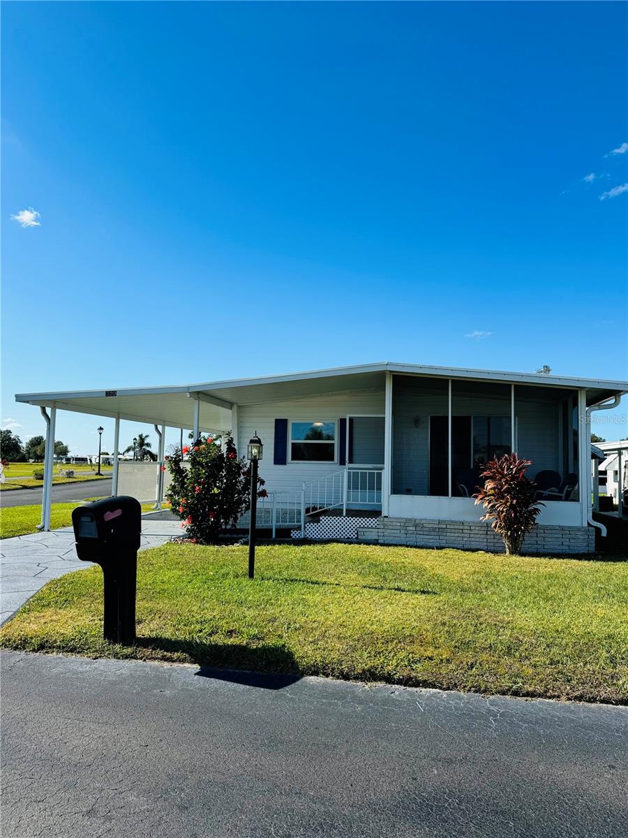 Enjoy this beautiful corner lot overlooking Lake Hamilton and the natural conservation area at Lake Region Village!  Looking for a low maintenance Florida Getaway?  This 2-bedroom, 2 bath park model is available fully furnished & move in ready! If you love boating, you're in luck, two boat slips are included in the sale! This highly sought after 55+ fun, active community is the place to be!  Ride your golf cart to all the daily activities & happy hours overlooking the lake! Pickleball, shuffleboard, dancing, horseshoes, card games, bingo & more are all available at Lake Region! There's something for everyone!  Relax by the heated pool which is open all year! The monthly maintenance fee of $327 is required & includes Cable TV & Internet. The monthly maintenance fee also covers water, sewer, garbage pickup, maintenance of common buildings, the grounds, use of all facilities & amenities!  Lawn care service can be added for $55 a month.  Whether you’re looking to live your best life year around or a winter getaway, Lake Region Village is the perfect choice! Just minutes to local restaurants, great shopping, golf courses & all of Florida's hotspots! Lake Hamilton is 2,184 sq ft of recreational fun offering boating & great fishing! The Winter Haven Chain of Lakes which connects Middle Lake Hamilton & Little Lake Hamilton to Lake Hamilton (Connected via canals) giving small boats access to many lakes! If you love boating, you're in luck, two boat slips are included in the sale! Or, you could rent them out! NO animals/pets of any kind are allowed in this park! Call to set up a tour of this hidden gem in Central Florida! Just 30 minutes to Disney Attractions! 1.3 miles to Port 27 overlooking the lake with restaurants, shopping & jet skis rentals! Set up your tour today!