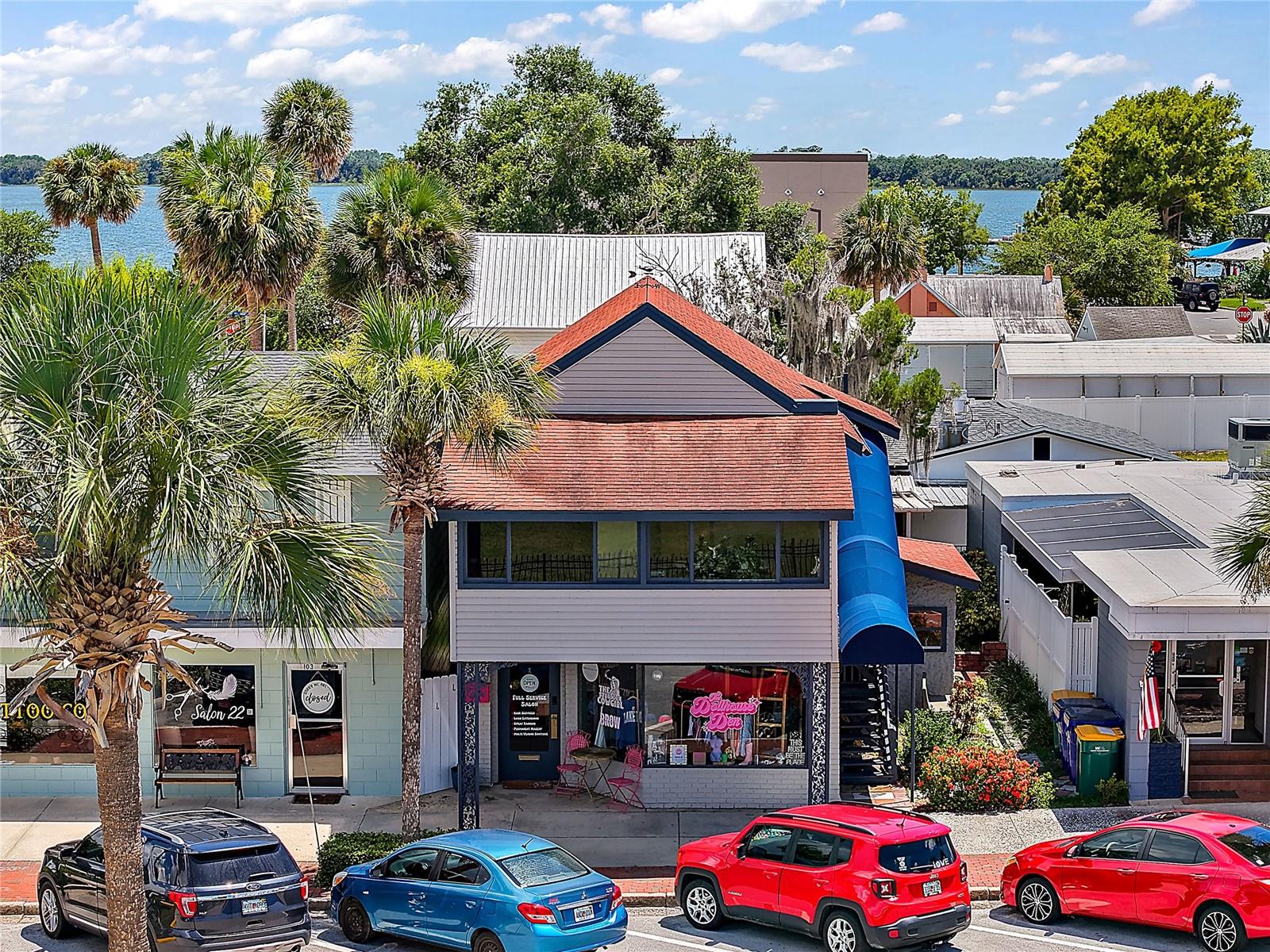 Investment Opportunity w/income and 100% occupied – 2 Tenants!  Great building located in historic, downtown Tavares - the County seat for Lake County.  The building consists of 2 units.  The upstairs is a renovated 2 BR / 1.5 BA apartment with a newly renovated deck/patio overlooking beautiful Lake Dora and is currently rented.  The downstairs was renovated and is currently rented to an established Hair Salon.  The building includes renovations such as new windows, new appliances, new paint, new flooring and a complete new kitchen in the upstairs apartment.  Both units have new HVAC units as of 2024 as well.  This is an investors dream.  Showings by appointment only.  DO NOT DISTURB TENANTS.  All information is believed accurate and correct but not guaranteed or warranted and subject to change without notice.