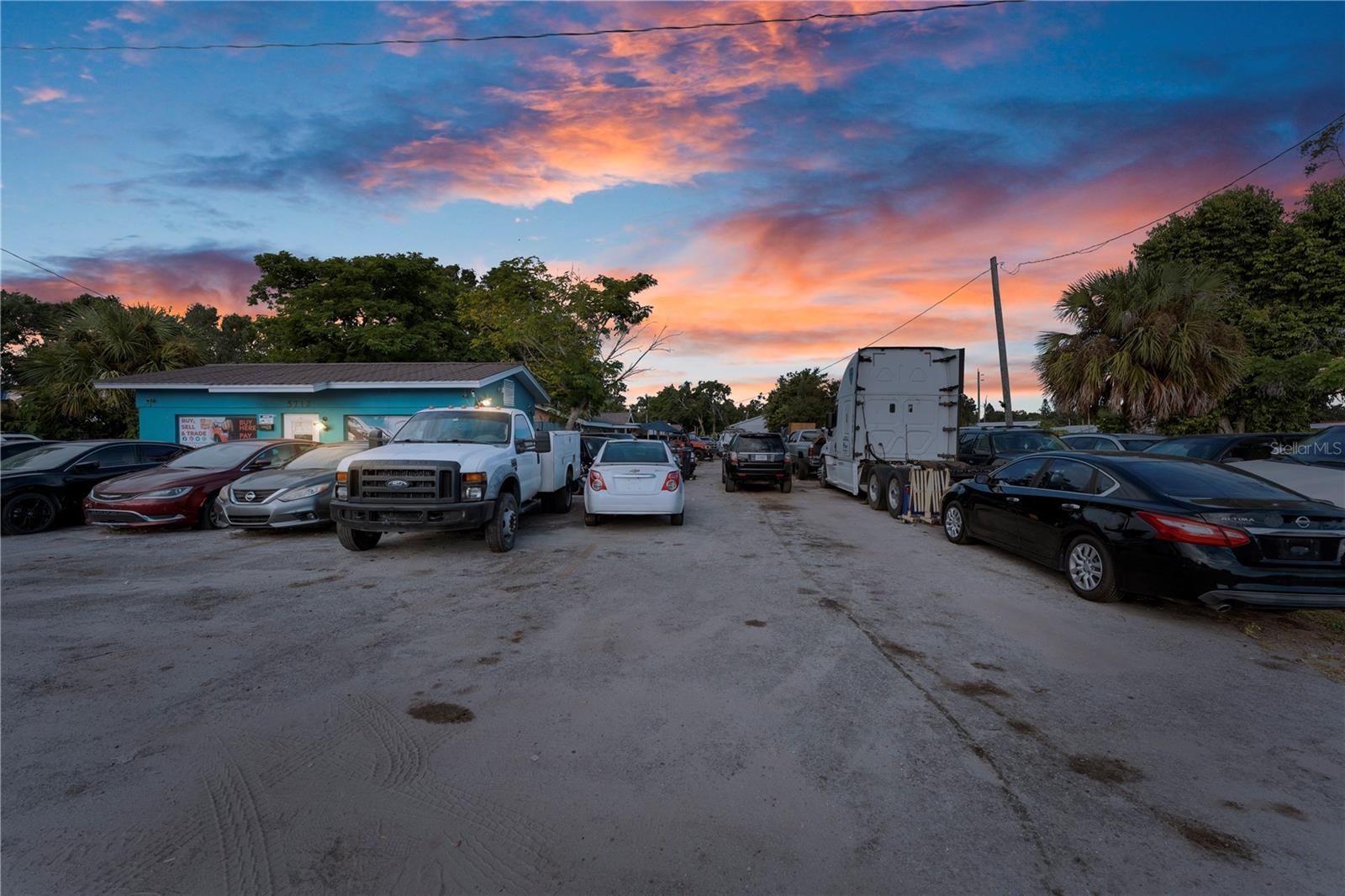 **SELLER IS OFFERING SELLER FINANCING AND WILL ALSO PROVIDE A 3% CLOSING COST CONCESSION AT CLOSING!! Prime investment opportunity on high-traffic 15th Street East! For over 20 years, this property has operated as a successful auto sales business with the added benefit of multiple income-producing rentals. Situated on nearly an acre of land, the property includes a 2BR/1BA unit, two 1BR/1BA units, one 3BR/1BA unit, plus an office building. With plenty of paved parking, additional storage areas, and space ideal for RV or boat storage, this property provides additional revenue potential. The flat layout and partially fenced lot add both security and flexibility for future expansion. Located on a heavily traveled corridor, this property offers outstanding exposure for any business. Whether you continue the existing auto sales operation or bring your own vision, this property is a rare opportunity to secure land, improvements, and income in a high-demand location. Listing price reflects land and improvements only. Auto inventory negotiable. Motivated seller—don’t miss your chance!