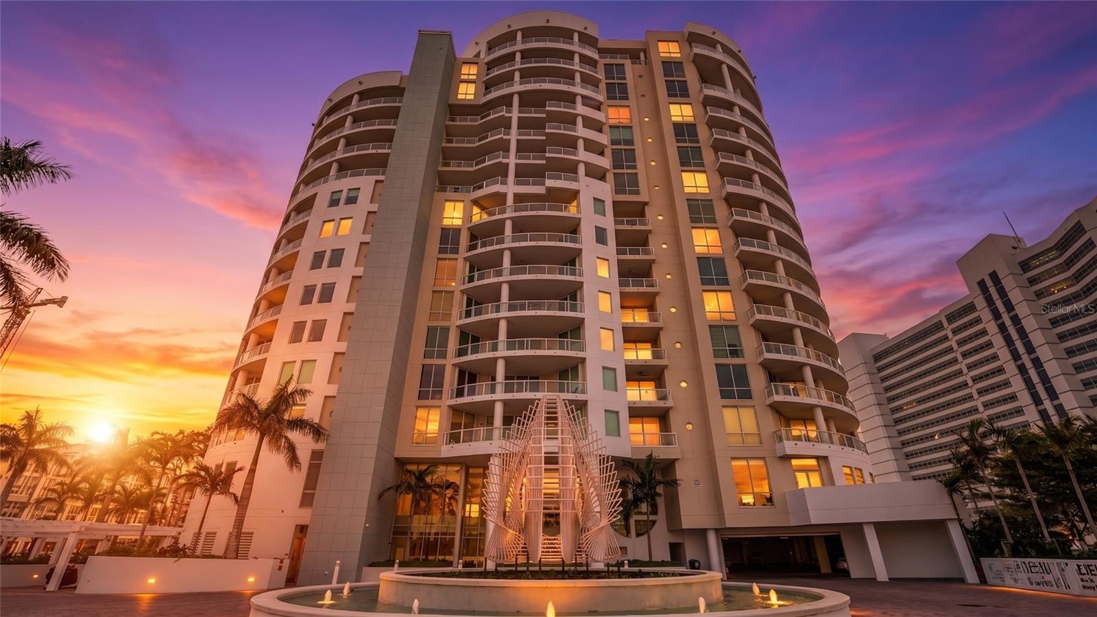 Welcome to a residence where the architecture is as iconic as the vistas it frames. Within the architecturally renowned Beau Ciel, this 3,135-square-foot condominium offers a rare dual-aspect living experience, capturing the full spectrum of Sarasota’s waterfront beauty from sunrise to sunset. Designed with an emphasis on scale and flow, this residence features two bedrooms, three full baths and a versatile family room which could be a third bedroom. The second bedroom has an elegant built-in office with a queen-size Murphy bed. Due to its size, every room is complemented by ample proportions and generous closet space along with access to balconies. The heart of the home, the eat-in kitchen, has been refreshed with all-new appliances. The positioning of this unit allows you to curate your backdrop based on the time of day. Enjoy the daytime views of the Bay and The Bay Park from the kitchen, family room and second bedroom/office, and by night the city lights surrounding the marina from the dining room, living room and primary bedroom. In addition, an air-conditioned storage locker and garage parking for two cars are included. Beau Ciel is celebrated not just for its sweeping curves and artistic silhouette, but for its robust, high-quality construction and 24/7 concierge service that ensures a peaceful, private sanctuary on a cul-de-sac. You are directly across from The Bay Park, Sarasota’s signature 53-acre waterfront destination featuring manicured trails, kayak launches, playground and The Nest snack bar. The Van Wezel Performing Arts Center and Sarasota Symphony Center are a short distance away, making it a central cultural arts destination. Experience the height of luxury where the Bay meets the marina.