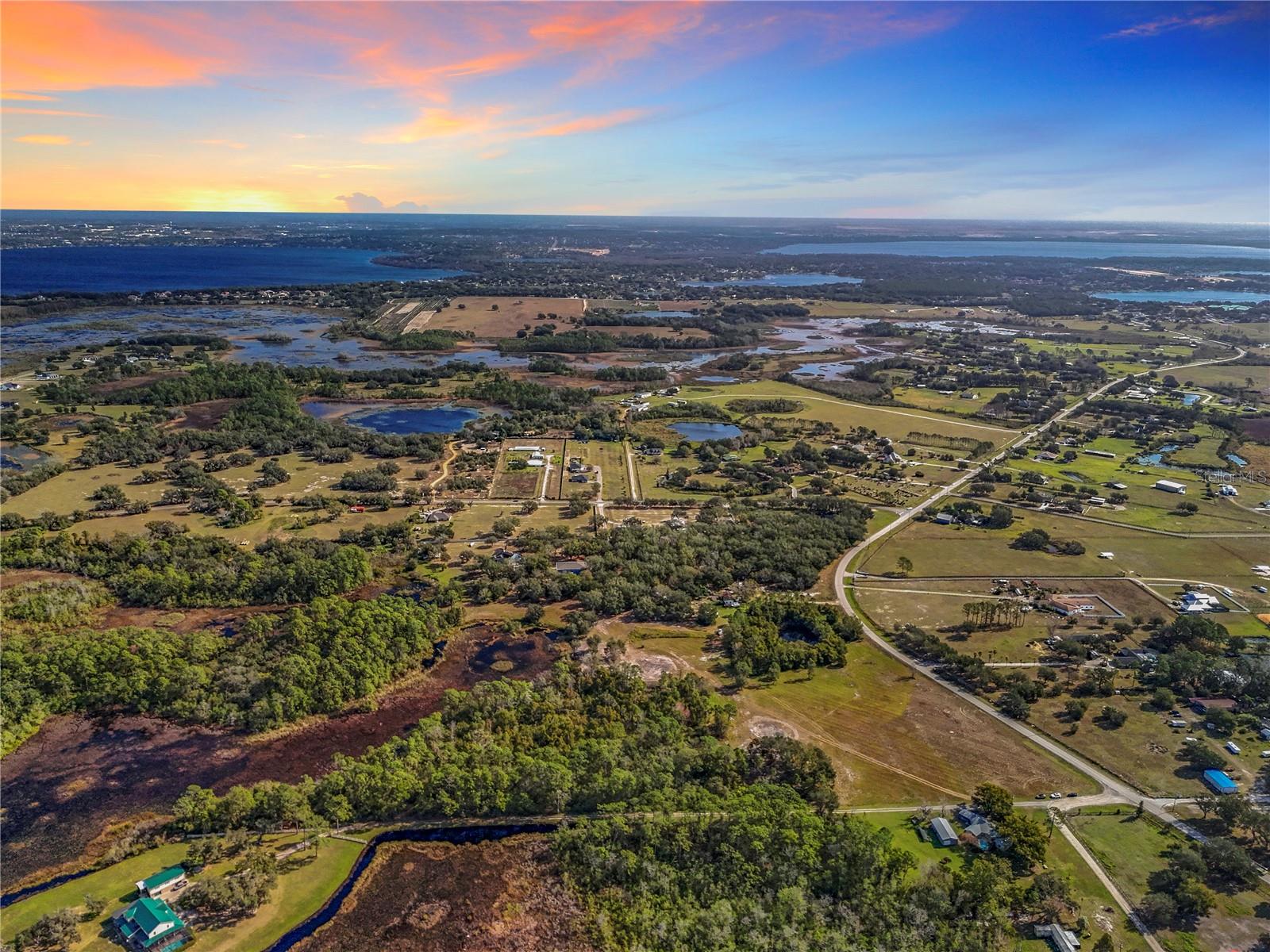 Escape to tranquility with this STUNNING 10.29 ACRE PROPERTY set in the rolling hills of Clermont. This unique parcel
offers endless possibilities for those seeking the perfect blend of RURAL LIVING and NEARBY MODERN CONVENIENCES.
Ideal for building your custom DREAM HOME, establishing a thriving HOBBY FARM, or dividing into separate parcels for
family, friends, or FUTURE INVESTMENT opportunities. Cleared acreage provides ENOUGH SPACE for constructing your
forever home and having horses, barns, and pasture, too. If you are looking for more land the 5+ acre parcel next
door is for sale also! The expansive property allows for exceptional privacy. The property is nestled among beautiful
natural landscaping and water for nature walks all within your very own property. The natural forest and wetland
acreage are waiting to be explored and are perfect for fishing, birdwatching, wildlife photography and so much more. It
feels as though you have escaped to an oasis with nature surrounding you with just the sounds of birds chirping and
breezes rustling through the trees yet located only 7 MILES from Clermont’s extensive DINING, SHOPPING and
ENTERTAINMENT venues! This truly is the best of both worlds! This property is located just 12 miles from the Van Fleet
Trail which is a 29-mile paved trail through the Green Swamp which is the headwaters for some of Florida’s most
popular paddling destinations! It is also located just under 20 miles to WINTER GARDEN VILLAGE and HISTORIC
DOWNTOWN WINTER GARDEN, 6 miles to Downtown Clermont, 27 miles to DISNEY and 40 miles to Orlando
International Airport. This is a MUST SEE! Do not wait because there is not much beautiful land left like this! Make your
dreams come true with this BEAUTIFUL PIECE OF PARADISE!