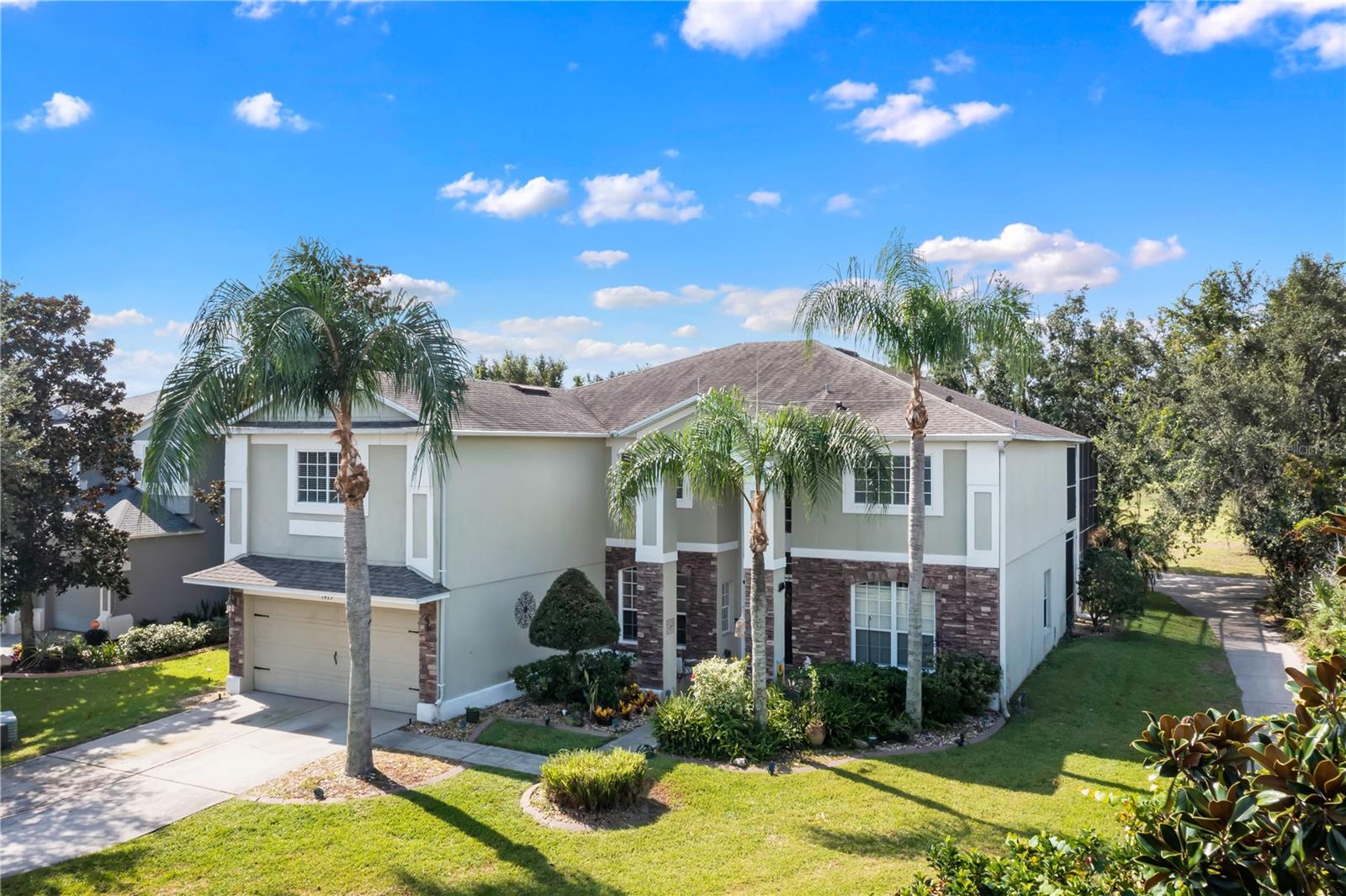 Location, Luxury, Lifestyle directly on the 9th hole! This 6-bed, 3-bath pool home is nestled in Stoneybrook West, a highly sought after golf community with a security person gated entrance. The seller is motivated and accepting offers. This large home boasts a spacious and thoughtfully designed interior, with an open floor plan. A large eat-in kitchen connects to the family room, complete with a charming decorative fireplace, or to a formal front dining room. Beyond a set of french doors is a private separate wing of the first floor- complete with a living room, bedroom and full bath.

New carpet (installed Sept 2023) leads the way up the stairs to the second level.  The master bedroom suite is generously sized and features a spacious en-suite bathroom, complete with dual sinks, a garden tub, a tiled walk-in shower, water closet and two roomy walk-in closets. Enjoy morning coffee on the second story balcony of the screened lanai - accessible from the master bedroom and overlooking the pool, golf course and mature trees.

There are three additional bedrooms with closets, an office, full bath and huge bonus room.  Imagine your own space for: music, art, exercise/workout/dance, education, crafts and more!  This 17x20 foot space has high ceilings and built in closets.

Enjoy the efficiency of two new A/C units (installed October 2021) and the protection of gutters with leaf guard and 4 lightning rods.  Seller states the pool is not heated but does have underwater lighting and the warranties on gutter guards, carpet and AC units are transferable.  
The community offers 24/7 guard-gated security and an array of amenities, including an Olympic-style swimming pool with stunning views of Lake, a splash pool, a world-class 72-par golf course, clubhouse, fitness center, playground, a fishing pier, a lake boat ramp, and courts for tennis, volleyball, and basketball.

This property is conveniently situated a short walk away from an award-winning school district, just outside the community gates. The historic downtown area of Winter Garden is a stone's throw away, offering a wealth of shopping and dining options at the Winter Garden Village at Fowler’s Grove. Moreover, the community enjoys close proximity to major transportation routes such as The Florida Turnpike, SR 429, I-4, and SR 408, providing easy access to Downtown Orlando, Disney World, Universal Studios, and Orlando International Airport. Nestled in a quiet cul-de-sac and backing onto the golf course, this house is an absolute must-see, offering a serene and picturesque setting with no rear neighbors.