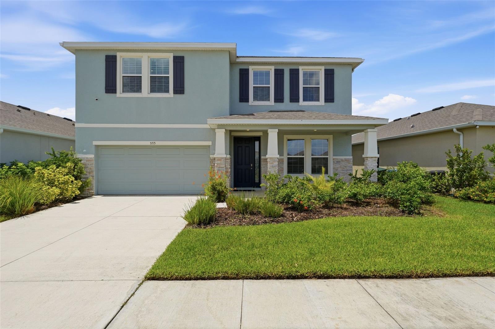 Welcome to 5715 Woodland Sage Drive, an exceptional 2022-built residence in the sought-after gated community of Promenade Estates in Sarasota. Offering over 3,300 square feet of thoughtfully designed living space, this beautifully upgraded four-bedroom, three-bath home seamlessly blends modern elegance, functionality, and tranquility. From the moment you step through the impressive extended foyer, you'll appreciate the home's clean architectural lines, abundant natural light, and effortless flow inspired by modern principles. The desirable southern exposure fills the home with sunshine while providing a peaceful and private setting. At the heart of the home is a stunning chef's kitchen designed for both everyday living and entertaining. Featuring luxurious Brazilian Patagonia island countertop and quartz counters and backsplacsh,  premium stainless steel appliances, an oversized center island, a spacious walk-in pantry, and an elegant butler's pantry leading to the formal dining room, this space is as beautiful as it is functional. Gorgeous porcelain wood-look tile flows throughout the main living areas, complementing the home's sophisticated finishes. The open-concept great room is bright and inviting, creating the perfect setting for family gatherings or hosting guests. A first-floor bedroom and full bath provide ideal accommodations for visitors, extended family, or a private home office. Upstairs, a spacious loft offers a versatile second living area perfect for a media room, playroom, or home office while showcasing  picturesque views of the surrounding preserve. The luxurious primary suite serves as a private retreat, featuring tranquil pond and preserve views, an expansive walk-in closet, and a spa-inspired ensuite bath complete with dual vanities, an oversized walk-in shower, and a relaxing soaking tub. Two additional generously sized bedrooms, a shared full bath, and a conveniently located upstairs laundry room complete the second level.
Designed with both style and practicality in mind, the home also offers abundant storage throughout and an attached two-car garage.
Residents of Promenade Estates enjoy a beautifully maintained gated community with resort-style amenities while being ideally located within the highly acclaimed Pine View School district. Just minutes from I-75, the Legacy Trail, world-renowned Gulf Coast beaches, shopping, dining, golf, and Sarasota's vibrant cultural attractions, this exceptional home offers the perfect combination of luxury, privacy, convenience, and modern Florida living.
This is a rare opportunity to own a meticulously maintained, move-in-ready home in one of Sarasota's most desirable communities.
