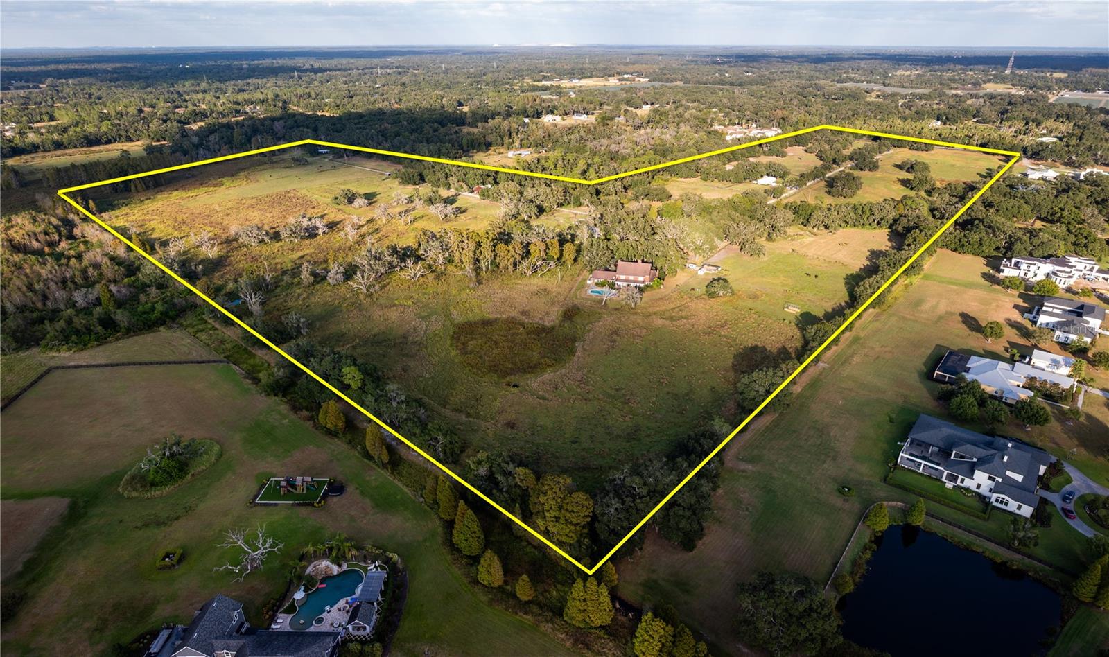 This property is being sold for LAND VALUE only and as a package deal along with 12002 Macintosh Rd and 12724 Tomar Drive. **Prime Development Opportunity – 82.17 Acres in Thonotosassa. An exceptional opportunity awaits developers and investors with this 82.17-acre assemblage consisting of three contiguous parcels being sold together as one package. The owners will not separate the parcels, ensuring a cohesive development canvas for your next residential or mixed-use project. Ideally situated in Thonotosassa, this expansive property offers easy access to I-4, providing convenient connectivity to Tampa, Plant City, and Orlando. The area is experiencing steady growth and demand for new residential communities, making this an ideal location for a new subdivision or planned development .With its size, location, and accessibility, this property presents a rare opportunity to shape one of the area’s next great communities. Don’t miss this chance to secure a prime piece of developable land in the heart of Thonotosassa.