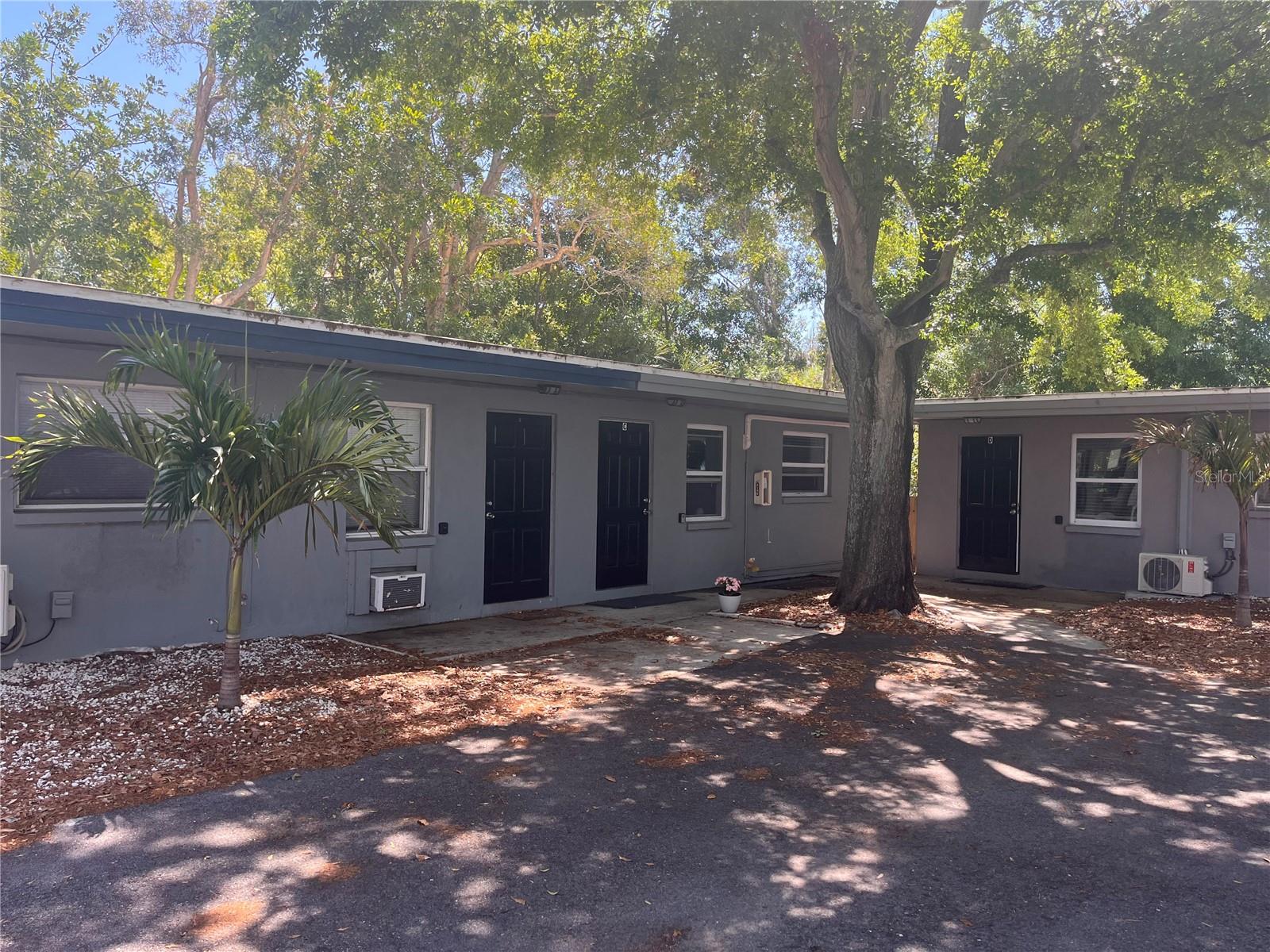 The property (all 1/1's) features a thoughtful mix of rental options, including traditional long-term leases and
flexible mid-term arrangements for a duration of 90 days or more. Of the five available units, three are
currently designated for long-term rentals, providing stable and reliable income. The remaining two units are
successfully rented on a mid-term basis through popular platforms such as Airbnb, VRBO, and Furnished
Finders, catering to a growing market of travelers and professionals seeking temporary accommodations. All
units boast a private & fenced outdoor space. This property sits outside the requirement for flood insurance.

This property is ideally suited for anyone looking to enter the lucrative world of Airbnb rentals.
With the current setup already established and operational, it offers a seamless transition for new investors
seeking to make their mark in the rental market. For seasoned investors, this property represents a fantastic
addition to an existing portfolio, enhancing diversification and revenue potential.  Units easily converted to all traditional rentals or all midterm rentals with the addition or omission of furnishings.