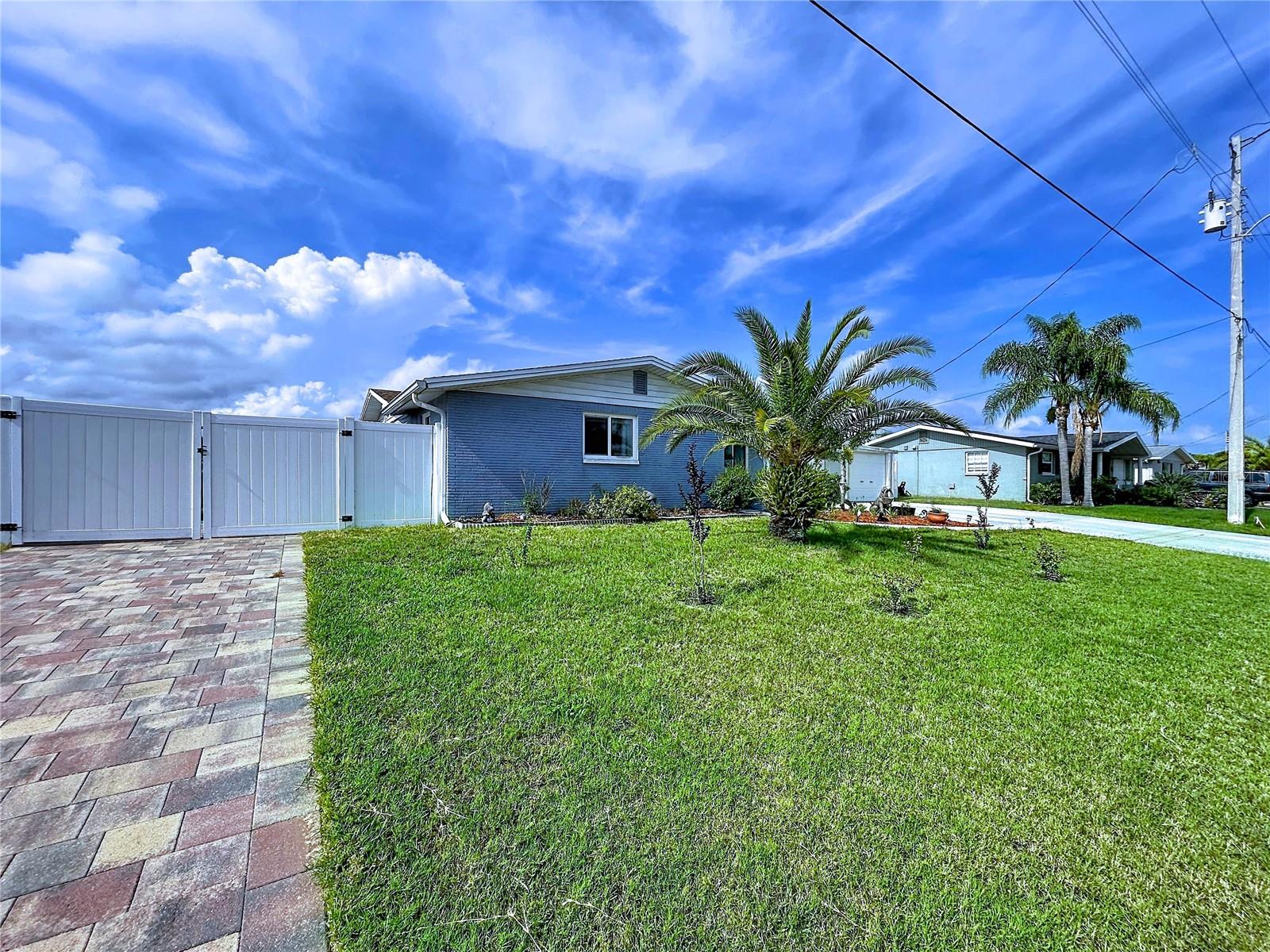 WATERFRONT LIVING WITH DIRECT GULF ACCESS! One of the standout features of this property is that the seller has already paid for the home's exterior to be professionally painted, giving the future owner the unique opportunity to select their own color and personalize the home's curb appeal before the work is completed. Additionally, the home is equipped with fully paid-off solar panels, allowing the next owner to enjoy the benefits of solar energy without assuming any solar loan or lease obligations.

Welcome to 6536 Leeside Isle, a versatile waterfront home offering 3 bedrooms, 2 bathrooms, and a unique layout designed to accommodate a variety of lifestyles. Situated on a deep-water canal with direct access to the Gulf of Mexico, this property is a dream for boaters, anglers, and anyone looking to enjoy Florida's waterfront lifestyle.

Inside, you'll find two full kitchens, creating an ideal setup for multi-generational living, extended family stays, guests, or flexible living arrangements. The thoughtful floor plan provides privacy and functionality while maintaining an inviting flow throughout the home.

Step outside and discover your own private waterfront oasis. The beautiful pool offers the perfect place to relax and entertain, while the floating dock and dedicated boat storage area make getting out on the water effortless. Whether you're heading to the Gulf for a day of fishing, island hopping, or simply enjoying a sunset cruise, you'll appreciate having direct boating access right from your backyard.

The outdoor living space is designed to take full advantage of the waterfront setting, providing plenty of room for entertaining family and friends, hosting poolside gatherings, or simply unwinding while enjoying the peaceful canal views.

Conveniently located near waterfront restaurants, shopping, beaches, golf courses, and everyday amenities, this property offers the perfect combination of coastal living and practical convenience.

Opportunities like this are hard to find—a waterfront home with Gulf access, a pool, floating dock, boat storage, two kitchens, and a layout suited for multi-generational living. Schedule your private showing today and experience everything this exceptional waterfront property has.