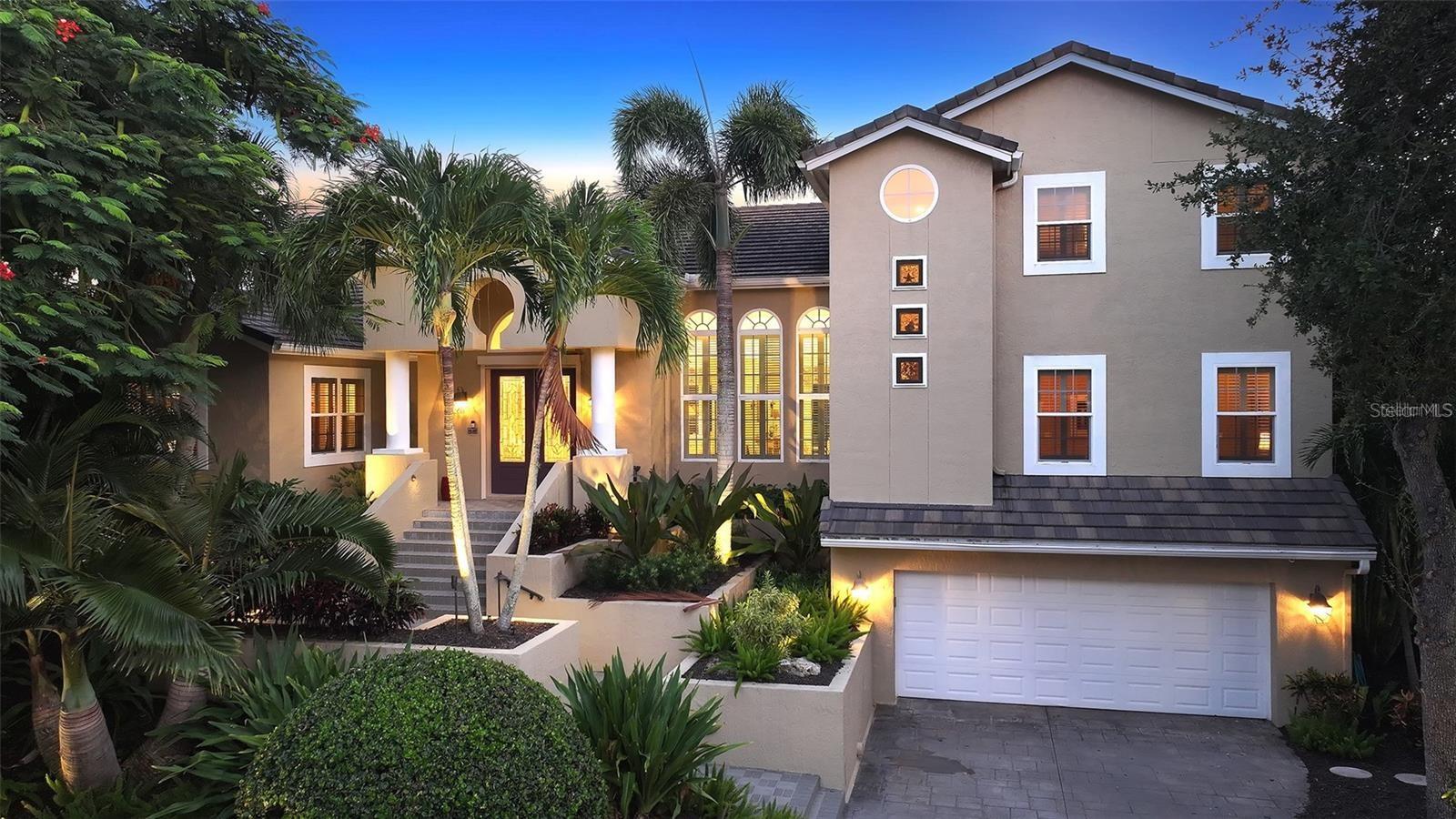 Embrace the resort lifestyle in the tranquil community of Sabal Cove, an exclusive collection of 38 custom single-family homes, nestled within the secure gates of Bay Isles on South Longboat Key. This is a rare opportunity to own a four-bedroom home that sustained no hurricane damage with a gorgeous backdrop on the 2nd hole of the Blue Harbourside Golf Course of the Longboat Key Club. The thoughtfully designed layout features two bedrooms on the main level; a spacious primary suite and a second en-suite bedroom, providing the perfect sanctuary for you and your loved ones. The primary suite invites you to relax in its large private bath and has his and hers walk-in closets. It is complemented by a cozy office space for those moments with inspiration strikes. Your guests will feel right at home with two additional bedrooms and a living area on the second level – ideal for enjoying time together playing games, watching TV, or listening to music. The heart of the home is the expansive kitchen, complete with high end Thermador and GE appliances, a gas cooktop, a wine cooler, elegant granite counters, and a charming breakfast room. Here you can gather with your guests in the open family room, warmed by the glow of the fireplace, with large windows framing picturesque views of the tranquil pond, lush golf course, and refreshing swimming pool and spa within the spacious lanai. In addition, you will appreciate the generous living room and formal dining area, perfect for hosting intimate gatherings or grand celebrations. With a three+ car garage and extra storage space, you have room for all the toys and treasures that bring joy to your life. As a resident of this vibrant community, you’ll enjoy exclusive access to the private Bay Isles Beach Club and the convenience of nearby amenities, including Publix, CVS Pharmacy, and the Longboat Key Tennis Center. For those seeking a blend of leisure and recreation, membership to the renowned Longboat Key Club are available, offering 45 holes of exceptional golf, exquisite dining, a fitness center, a beautiful marina, and state-of-the-art tennis and pickleball facilities. Take a short drive to St. Armands Circle where endless shops and restaurants await you, creating the perfect backdrop for both relaxation and adventure. This is more than just a home; it’s an invitation to live the life you’ve always dreamed of!