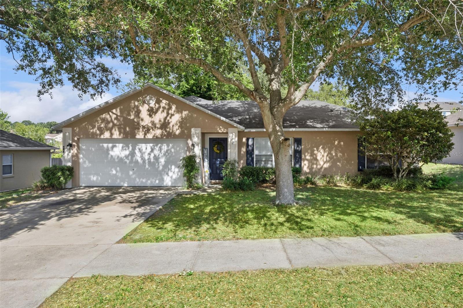 One of the BEST VALUES in Minneola - beautifully updated, move-in ready, and offering rare backyard privacy with no immediate rear neighbors in Quail Valley. Welcome to 648 Tranquility St, Minneola FL, a beautifully upgraded 3-bedroom, 2-bath home in one of Central Florida’s fastest-growing areas, just minutes from the Florida Turnpike, N. Hancock Rd, Clermont, and top-rated Lake County schools. With continued growth, new development, and expanding infrastructure throughout Minneola and the surrounding Clermont corridor, this location offers both convenience and long-term value. This move-in ready home features an open floor plan with soaring vaulted ceilings, updated wood-look tile flooring, new carpet, and a desirable split-bedroom layout that lives comfortably for both everyday living and entertaining. The fully renovated primary bathroom (2026) is a standout with a stunning walk-in shower, beautiful new vanity, and sleek finishes, paired with a spacious primary suite and walk-in closet. The kitchen has been refreshed with updated cabinetry, an upgraded backsplash, a new microwave, and a window overlooking the backyard, bringing in natural light and a warm, inviting feel. Step outside to a fully fenced backyard with mature trees, no immediate rear neighbors, and an oversized screened enclosure, creating a private outdoor retreat rarely found in Minneola homes for sale, plus a storage shed that conveys. Major updates including AC (2021), roof (2021), interior paint, and flooring make this home truly turn-key with peace of mind. Complete with a 2-car garage, low HOA, and a prime location near Clermont, shopping, dining, and major highways, this is a standout opportunity for buyers searching for an updated home in Minneola, Clermont, or Central Florida that offers space, privacy, and value.