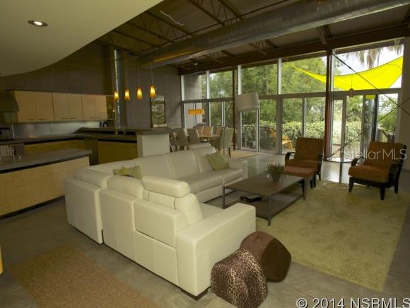 Renowned Architect's personal modern home from the late firm Schweizer/Waldroff. This 3BR/2.5BA waterfront beachside contemporary loft style open floorplan is nothing short of a masterpiece. In the spirit of Frank Lloyd Wright, this showplace is merged with nature. To enter the property, you drive through a tunnel of trees and are immediately greeted by a work of art. Words cannot do this home justice. Features include exposed architectural block walls, concrete columns and steel turnbuckles, a 100 gal koi pond w/ fountain, commercial grade floor-to-ceiling windows, 14'ceilings with loft space, concrete floors and countertops, vessel-top sinks, open steel bar joists with pine wood ceilings, fireplace, nautical shell formed showers with chicklet tiles and garden spa tub with frameless glass with view of the treetops, barn-style rolling doors, flat-screen wall-mounted tv's in every room, SS appliances with commercial kitchen gas range, 580SF 1st floor bonus space, NEW poured concrete entry stairs 2015, NEW 16 SEER AC 2015, 2012 new roof and 2014 new exterior paint,over 1300 sf of exotic Ipe wood decks and a dock with boat davits, providing small boat access to some of the best fishing in the world. Short walk to NO DRIVE beach! Say 'NO' to the typical builder home and 'YES' to this one-of-a-kind. Schedule your private viewing quickly as homes like this are ultra rare. ALL FURNISHINGS ARE NEGOTIABLE AND MAY BE INCLUDED IN PURCHASE PRICE. ALL MEASUREMENTS ARE APPROXIMATE. ;Water: City