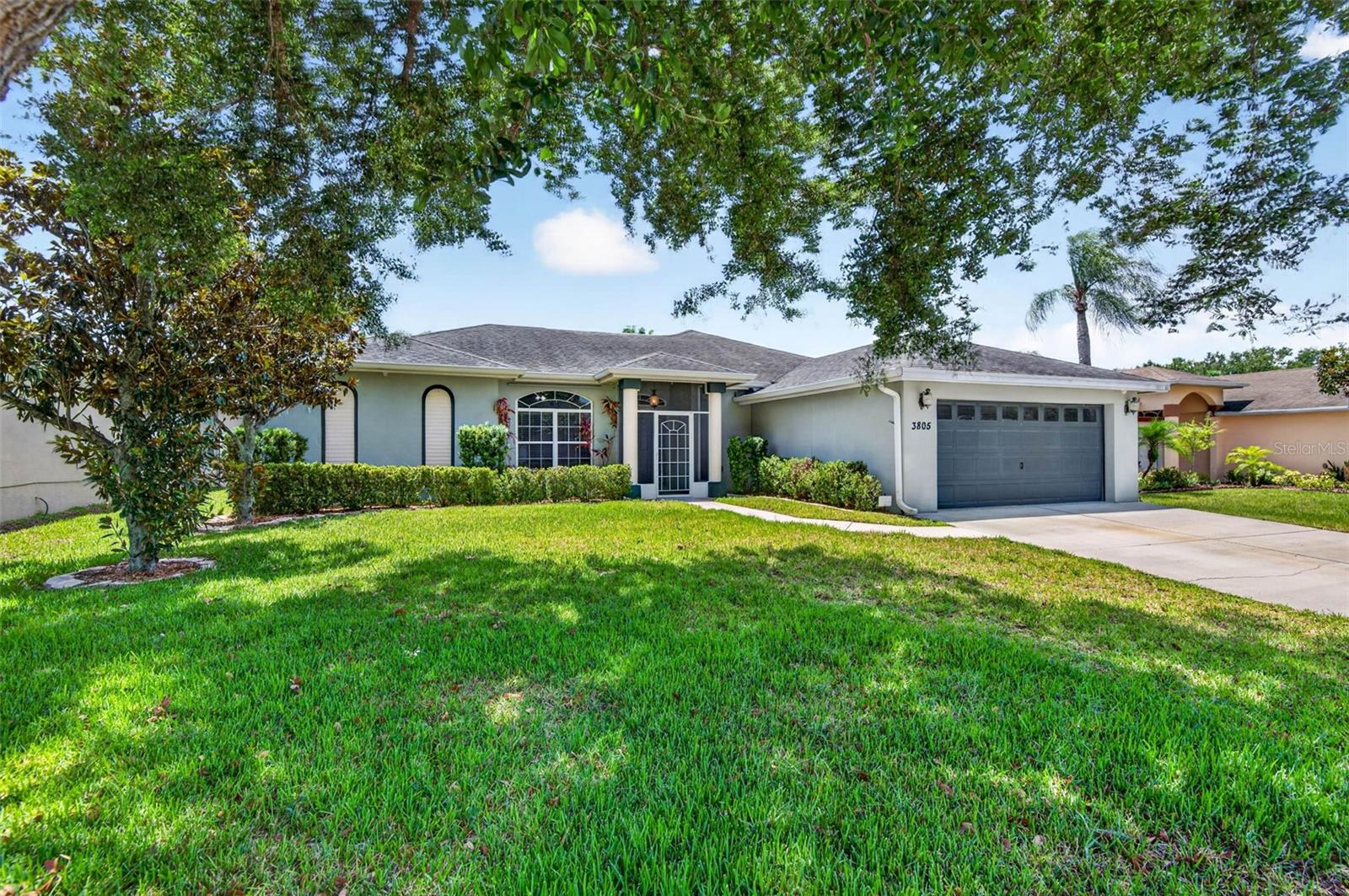 Located in a gated village within a golf course community with **NO CDD fee**   Even though has a Sun City Center zip code.  This community is open to ALL ages.   This well-built semi-custom home by Miller Florida Homes offers exceptional value and quality craftsmanship. While the interior may benefit from fresh paint to suit your personal taste and carpet replacement in the spare bedrooms, the price reflects these cosmetic updates, making this a great opportunity to own in a neighborhood surrounded by higher-priced homes. **A NEW ROOF will be installed prior to closing for added peace of mind. Recent updates include the WATER HEATER, WASHER, DISHWASHER, GARAGE DOOR OPENER, WATER VALVE, and a beautifully UPDATED PRIMARY BATH featuring Upgraded Cabinetry with extensive Storage, Countertops, Rain Shower Head and Spray Hose, Matching Plumbing/Accessory Fixtures, Built-in Magazine Rack in water closet.  Decorative rock tile shower floor with matching tile outside the shower to serve as a permanent Bath-Mat. **Architectural details throughout include Rounded Corners, Recessed Arches, Plant Shelves, OVER-CLOSET STORAGE in Bedroom 2, and a Built-in PET / VACUUM CUBBY.   **The OVERSIZED GARAGE extended 7 feet DEEPER, ideal for longer vehicles, boat, additional storage or workshop space with numerous Electrical Outlets and Ceiling Fan.  Two Dedicated 20-amp outlets suitable for a golf cart or freezer. 
**Plus, 8x8 wood decking in attic for additional storage.  
Ceramic tile flooring in the kitchen and baths, Laminate flooring in the great room and den, Large Windows for abundant natural light, and 12-foot wide GLASS POCKET SLIDERS opening to a spacious SCREENED LANAI.  **Outdoor features include a Vinyl Privacy Fence with two Gates, PRIVATE SUN DECK pre-plumbed for an outdoor shower and Conduit for future electrical outlets, PERMANENT HOLIDAY LIGHTING in the front soffits, 5 EXTERIOR SECURITY CAMERAS. STORM PANELS for windows and sliders.   **Money-saving features:  NO CDD fees, a SEPARATE IRRIGATION WATER METER to avoid sewer charges when watering the lawn. Hose bib connected to the irrigation line for lower-cost outdoor water use such as washing the car.  **WIDER DRIVEWAY (21’) allows convenient side-by-side parking with room to step out onto concrete instead of grass.  **Many more details in this home to list here.  
Make your appointment today to see before it's gone. 
Convenient location, easy access to I-75 to Brandon/Tampa, St. Pete, Bradenton/Sarasota to airports, beaches and entertainment.  
Plus, within 5-minute drive to a new Publix, medical facilities, gym, restaurants and other shopping.  
Don’t miss this opportunity to own a quality-built home in an established golf course community at an attractive price point.
