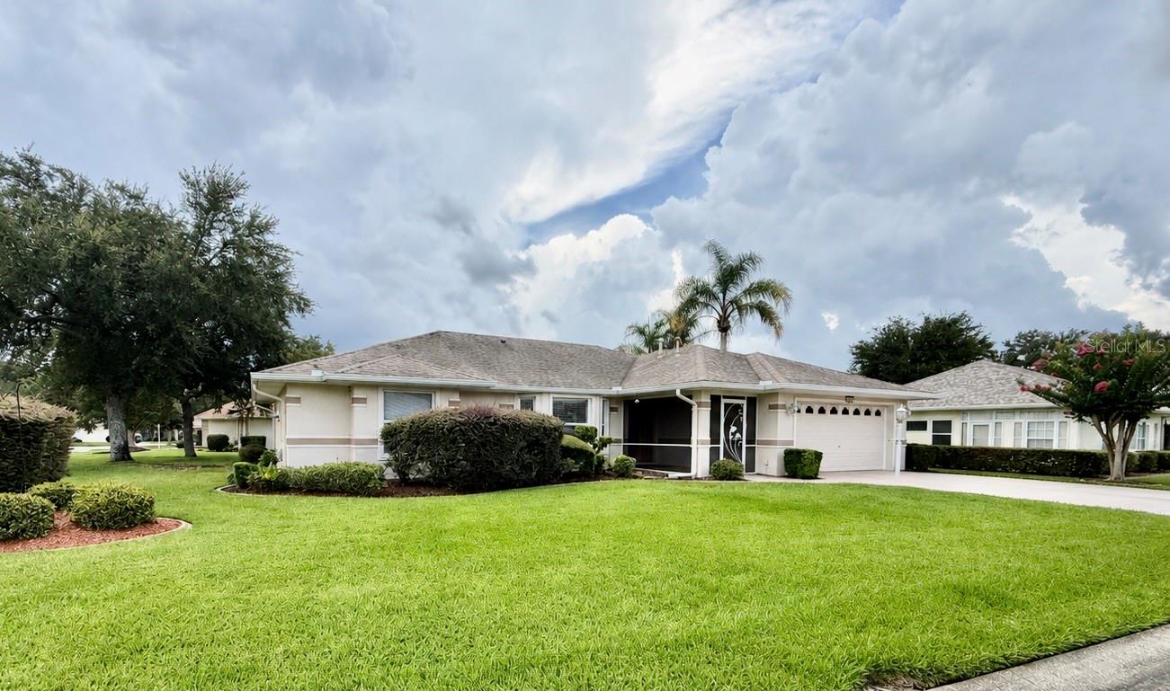 Welcome to this beautifully maintained 3-bedroom, 2-bathroom Princess floor plan home located in the highly sought-after 55+ community of Royal Highlands. Situated on an oversized corner lot, this home offers exceptional curb appeal, thoughtful updates, and comfortable Florida living.

The enclosed lanai features vinyl windows, creating the perfect year-round space to relax or entertain, and includes a HOT TUB that is in great for relaxing in the evening. Additional exterior features include gutters surrounding the entire home and a transferable termite bond for added peace of mind.

Major updates have already been completed, including a new roof (2018), A/C (2015), and water heater (2020). Inside, you’ll find ceiling fans throughout, along with most appliances having been recently replaced, including a newer washer, dryer, and dishwasher.

Royal Highlands is a premier gated 55+ golf community offering an active lifestyle with an 18-hole championship golf course, clubhouse, restaurant, fitness center, indoor and outdoor pools, tennis and pickleball courts, softball, bocce, walking trails, and a full calendar of clubs, activities, and social events.

Conveniently located just minutes from the Florida Turnpike, this home offers easy access to Orlando, world-famous Walt Disney World, Orlando International Airport, shopping, dining, medical facilities, and Central Florida’s beautiful attractions—making it an ideal place to enjoy both relaxation and adventure.

Don’t miss this opportunity to own a move-in-ready home in one of Central Florida’s most desirable active adult communities!