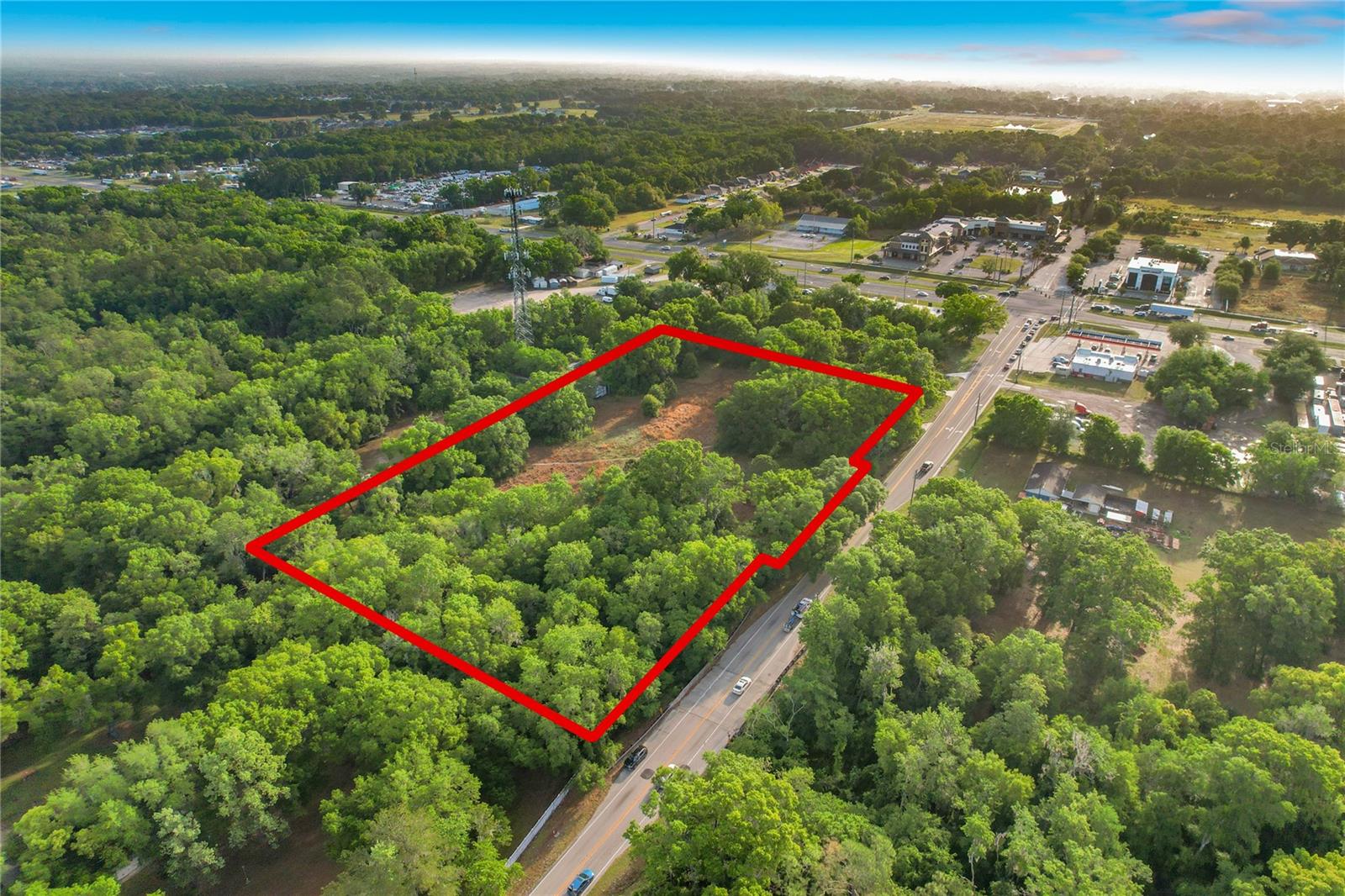 Prime 5.56 Acres | North Lakeland (33810) | Exceptional Frontage & Development Potential

Discover a rare land opportunity in one of Lakeland’s fastest-growing corridors. This 5.56-acre assemblage in North Lakeland includes three parcels (L4961354 - 0.70, 0.72, and L4961353 - 4.14 acres) being sold together—perfect for developers, investors, or anyone envisioning a private estate with room to grow.

Positioned just off US Highway 98 North, the property features 803 feet of prime frontage on Duff Road — delivering outstanding visibility, access, and flexibility for future use. With an approximate 300-foot depth, the layout supports a variety of residential or investment configurations. (Three lots - 593 feet plus 105 feet plus 105 feet for a total of 803 feet of prime frontage on Duff Road.)

Located in rapidly expanding North Lakeland, the site benefits from strong nearby residential, commercial and retail growth with an increasing demand for land. Quick access to I-4 connects you to Tampa, Orlando, and the broader Central Florida market—enhancing both commuter appeal and long-term value.

Key Highlights

5.56 total acres (3 parcels sold together)
803 ft frontage on Duff Rd 
Prime location just off US-98 N in North Lakeland (33810)
Utilities nearby (water & electric)
Ideal for residential, commercial, retail development, subdivision, private estate, or buy-and-hold
Close to shopping, schools, and major roadways
Whether you’re planning multiple homesites, a private compound, or a strategic land hold in a high-growth area, this property offers the scale, frontage, and location to bring your vision to life.

Lakeland’s continued growth makes this an opportune time to invest. Buyers are encouraged to verify zoning, land use, and development options with local authorities.