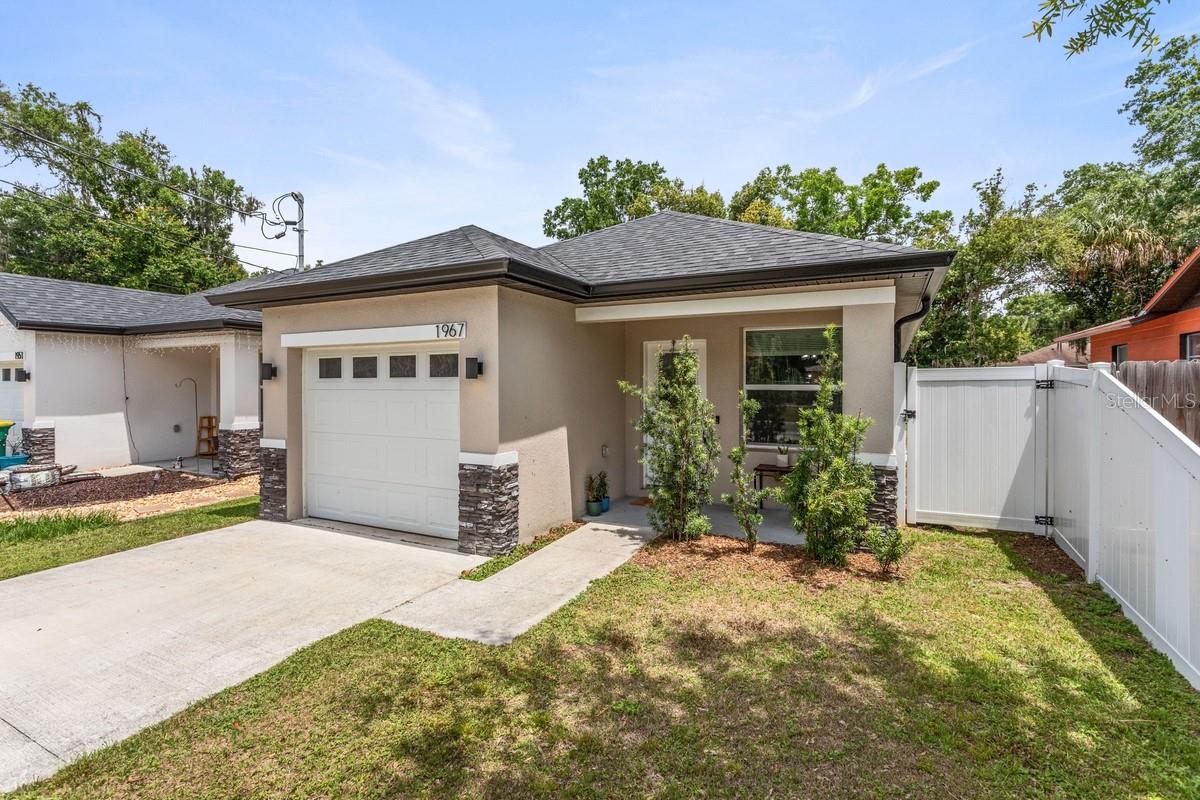 You will not want to miss this adorable home! This almost new home built in 2023 is waiting for a new owner! Just unpack and settle immediately, no need for updates or repairs. A modern open floor plan features a living/dining/kitchen combo, ideal for gatherings and entertaining. Plenty of natural light and a lovely tray ceiling compliment the living area. The kitchen features stainless steel appliances, 42" cabinets, quartz countertops, pantry, and breakfast bar. Wow, it doesn't get any better! A comfortable primary bedroom offers an en-suite bath with a step-in shower and quartz countertop. There are two additional bedrooms with walk-in closets plus a separate build-in office/desk space which can be ideal for remote work, study or reading. Enjoy the privacy of the fully fenced backyard perfect for your 4-legged friends! Enjoy the inside laundry room and a one car garage. Centrally located just a short drive from downtown, middle and high school, and easy access to roads (19, 44, and 441). No HOA! Don't miss out on this one, see it today!
