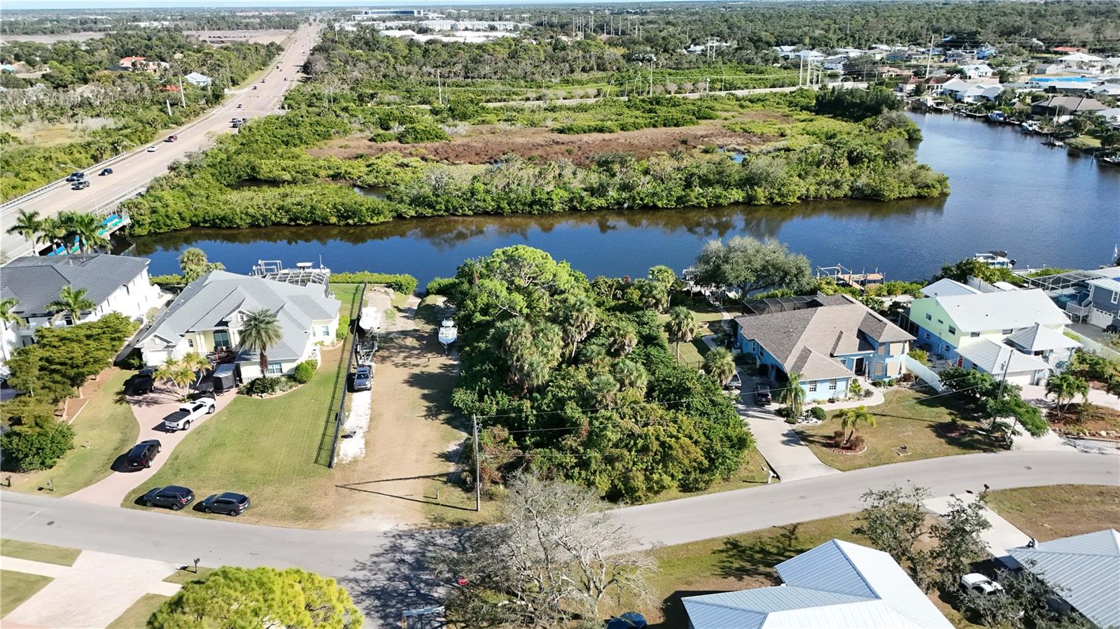 Discover one of the very few remaining buildable waterfront lots on sought-after Shakett Creek. Located on Bayview Drive (PID# 0383010003) in Nokomis, this property offers an exceptional opportunity to design and build your dream home in a serene coastal setting.
The lot boasts stunning water views across the wide creek, where you can enjoy daily sunrises, the peaceful flow of the water, and abundant Florida wildlife. With direct access to Shakett Creek, you’ll experience a rare combination of privacy, natural beauty, and convenience — all just minutes to the Gulf beaches, Legacy Trail, waterfront dining, and easy I-75 access.
Whether you're a custom builder seeking your next project or a buyer envisioning a brand-new waterfront retreat, this homesite is primed and ready for new construction. Opportunities like this are increasingly scarce — don’t miss the chance to own one of the last premium buildable lots in this coveted Nokomis waterfront community.
