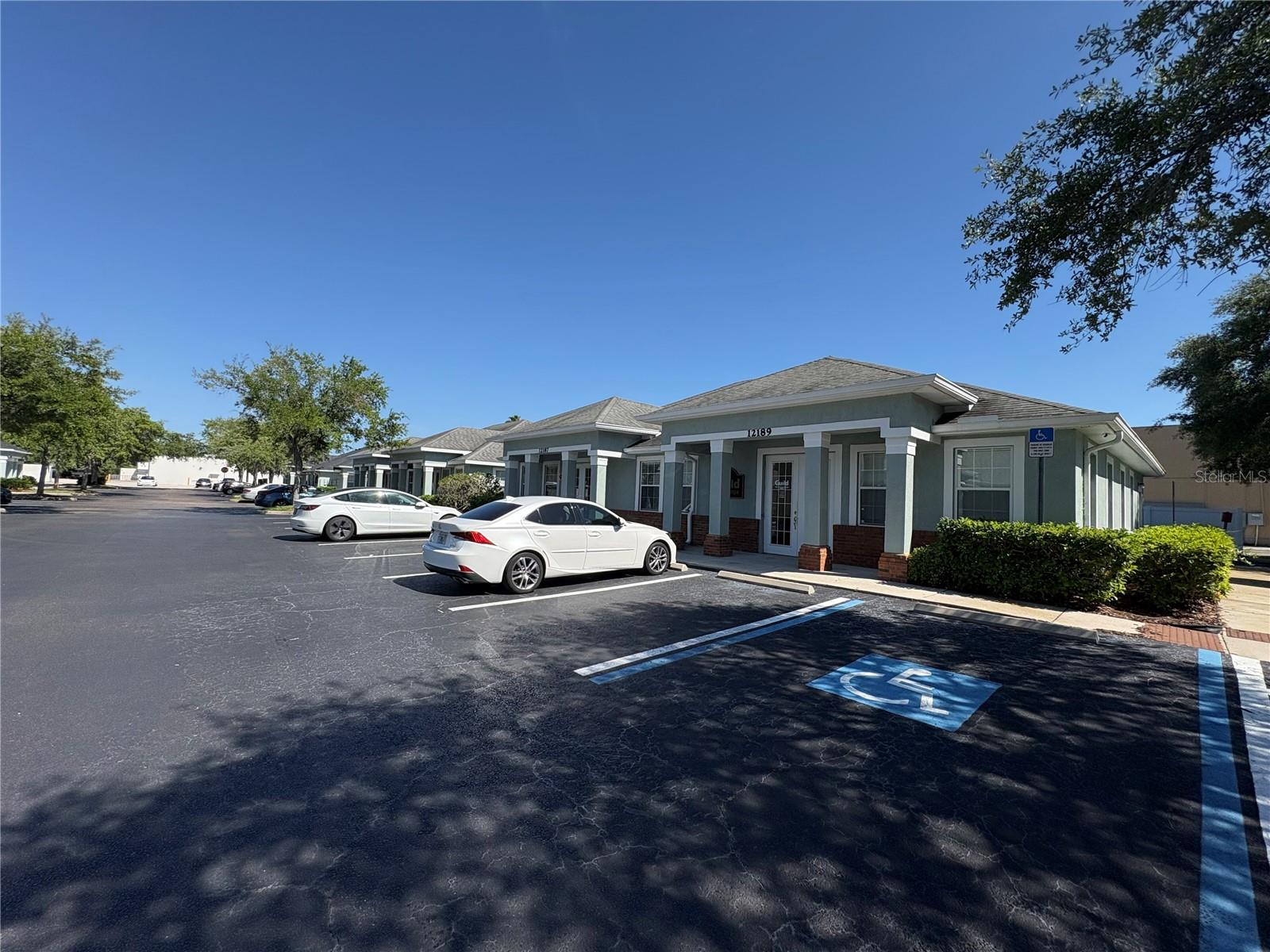 VILLAGE PLAZA AT WESTCHASE - Commercial Lease