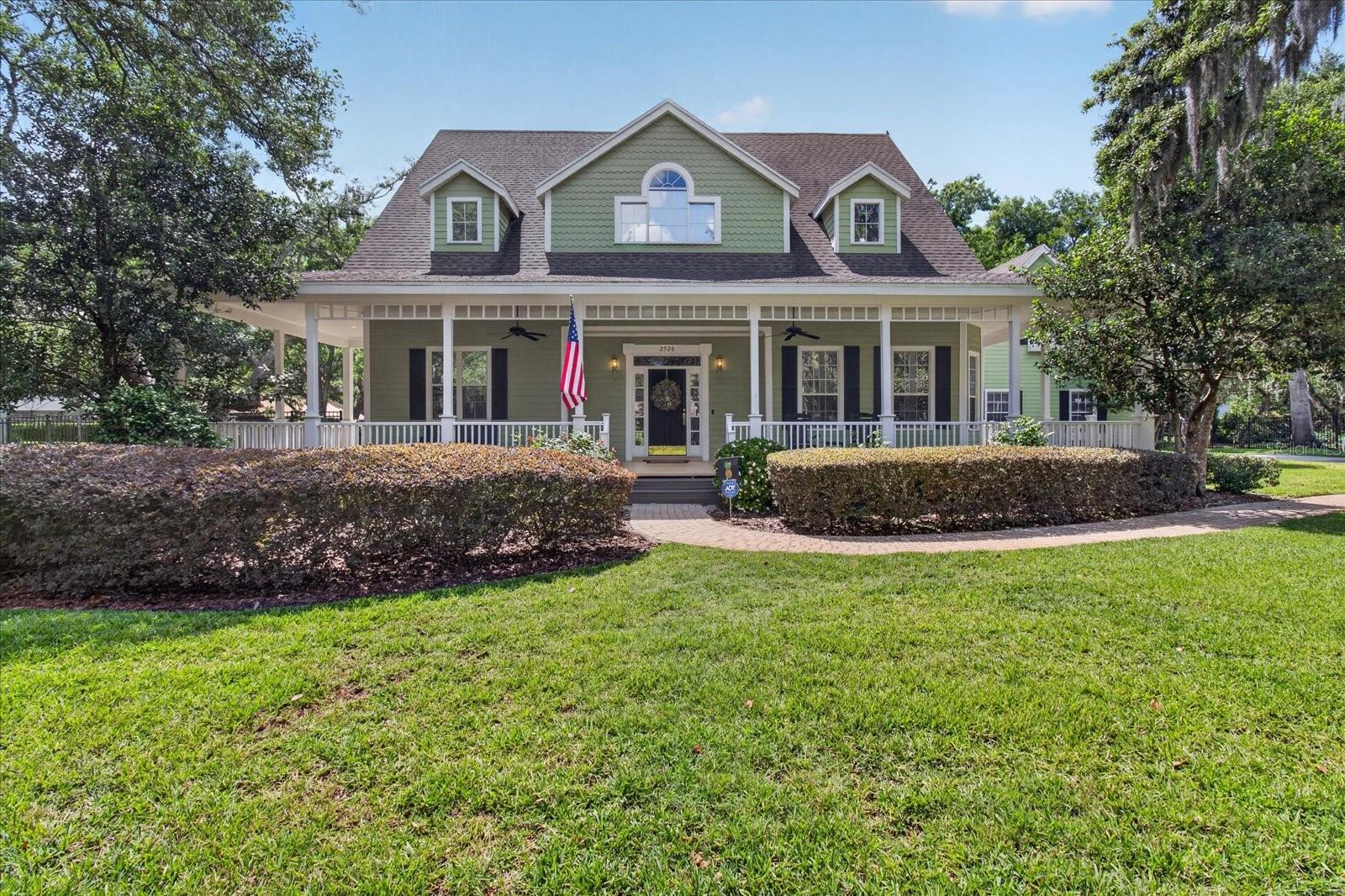 Virtually Staged. Don’t miss your chance to own this elegant Southern charmer in the highly sought-after Chelsea Woods community!

Tucked beneath majestic live oaks draped in Spanish moss on nearly half an acre, this stunning 5-bedroom, 5-bathroom, 4,058 sq ft home delivers authentic Old South charm with impressive scale and modern functionality.

You’re greeted by a large wraparound front porch perfect for rocking chairs and entertaining, complete with a long brick paved driveway that can comfortably fit 8+ cars — ideal for hosting parties and gatherings with plenty of guest parking. The brick paved front walkway adds to the welcoming curb appeal.

Step inside the giant two-story foyer with soaring ceilings that set a grand tone. The great room impresses with dramatic 25-foot ceilings, an oversized ceiling fan, built-in bookshelves, and beautiful slate flooring, while the second floor offers a dramatic overlook into this expansive space. Rich hardwood floors flow throughout the rest of the home.

The well-appointed kitchen opens seamlessly to the main living areas, ideal for family life and entertaining. A standout office area features French doors on both walls, creating a bright and elegant workspace.

The primary suite is conveniently located on the first floor and offers a luxurious retreat with his and hers walk-in closets, beautiful wainscoting in the bathroom and hallway for an elegant touch, hardwood floors in the bedroom and hallway, and Coralina tile in the bathroom.

Upstairs you’ll find a spacious bonus room that serves as a second living room, plus a versatile room above the garage that includes a half bath, closet, and extra storage — perfect as a private home office, teenage retreat, or guest suite.

Outside is a true resort-style escape: a screened-in pool with a brick paved deck, an oversized brick paved fire pit area perfect for entertaining, and a brick paved path connecting them, all framed by the beautiful live oaks and lush landscaping. French doors from the main living area open directly to this private backyard oasis.

Additional highlights include a 2-car garage, double-paned windows with solar film that help reduce heat and lower utility bills, and a private well — meaning no water bill. You’re also in a prime location — minutes (and even walkable) to Publix, a coming soon Whole Foods, dining, and medical facilities, in the heart of Bloomingdale, with an exceptionally low HOA of just $30 per year.

Sellers are offering $7,000 in concessions toward upgrades or appliances.

This home delivers the space, presence, and lifestyle today’s move-up buyers are looking for.