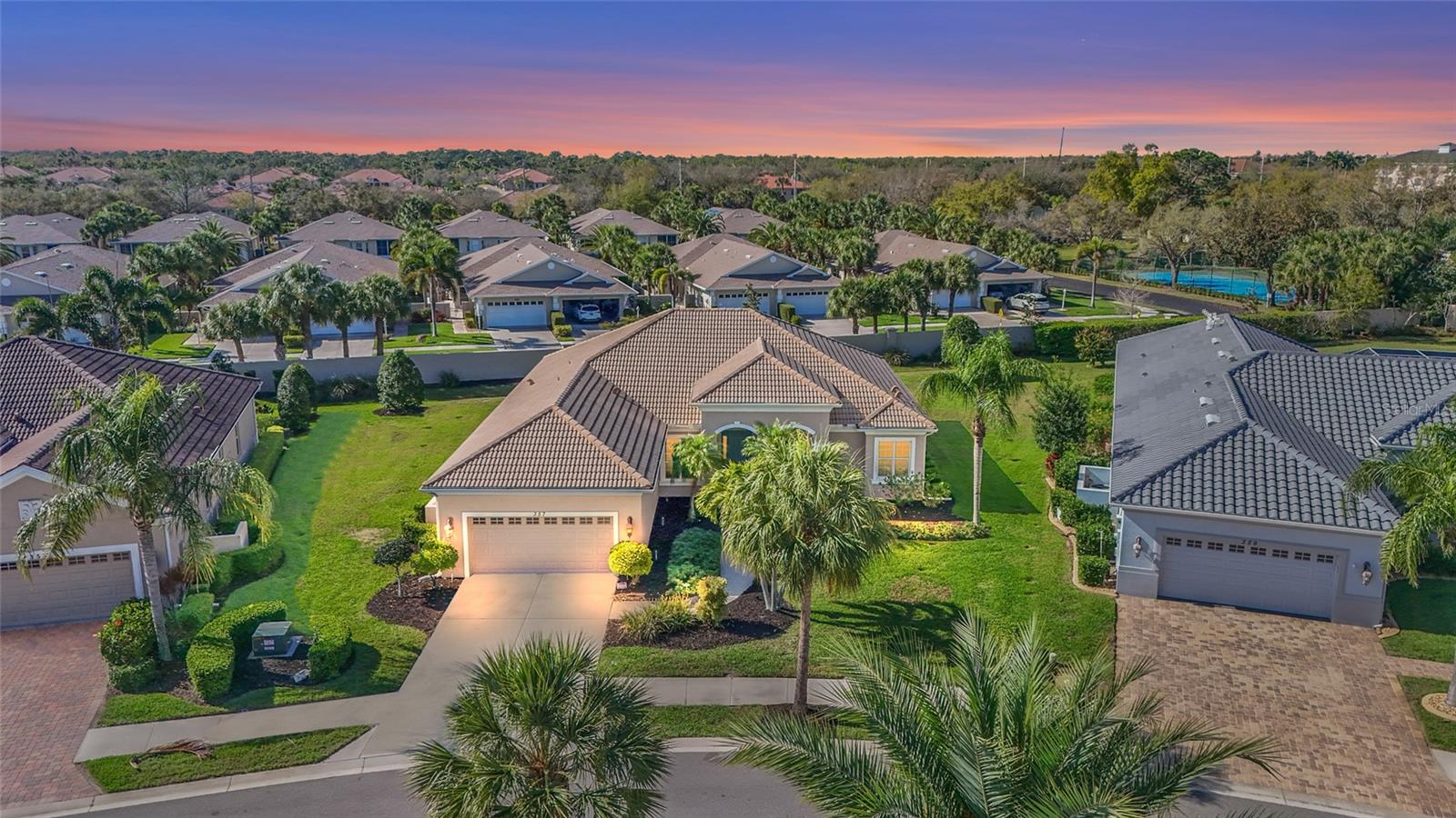 Welcome to Sawgrass, a GATED COMMUNITY with controlled access offering privacy, security, and a vibrant neighborhood lifestyle with NO CDD FEES and LOW HOA dues. This beautifully upgraded 3 bedroom, 2 bathroom home with an OVERSIZED 2 CAR GARAGE features a private pool, perfectly positioned for relaxing Florida days and effortless entertaining.

The open great room floor plan seamlessly connects the living room, kitchen, and breakfast nook, creating a bright and inviting living space. The kitchen is thoughtfully designed with upgraded wood cabinetry, Corian countertops, a tile backsplash, pendant and recessed lighting, and a propane powered gas stove.

Durable plank style engineered hardwood flooring runs throughout the main living areas, while the bedrooms offer comfortable carpeting. Additional interior upgrades include crown molding, updated lighting, and modern fixtures.

This versatile layout offers a separate office and formal dining room, plus an additional bonus room that can easily serve as a media room, hobby space, or guest retreat. The split bedroom floor plan provides privacy, with the spacious primary suite set apart from the guest bedrooms. The primary suite features an en suite bath with dual sinks, a walk in shower, and a relaxing garden tub.

The oversized 24' x 20' garage provides generous space for vehicles, storage, or a workshop. The exterior has been freshly repainted, and new landscaping completed last week enhances the home’s curb appeal. Property also features hot water tank that was installed in 2023.

Residents of Sawgrass enjoy a beautifully maintained community featuring approximately 54 acres of lakes, preserves, and green space, along with excellent amenities including an updated clubhouse, fitness center, heated community pool, tennis and pickleball courts, and a variety of organized social activities and clubs. 
Sawgrass is connected to WATERFORD GOLF CLUB, featuring a 9 hole course designed by Ted McAnlis, with optional membership - not mandatory, allowing residents to enjoy the golf course setting without required fees.

Ideally located in Venice, this home offers easy access to beautiful Gulf beaches, shopping, dining, and historic downtown Venice, as well as nearby nature destinations like Curry Creek Preserve and Pinebrook Park, making it the perfect combination of lifestyle, location, and comfort.

Schedule your private showing today and discover all that this exceptional home has to offer.